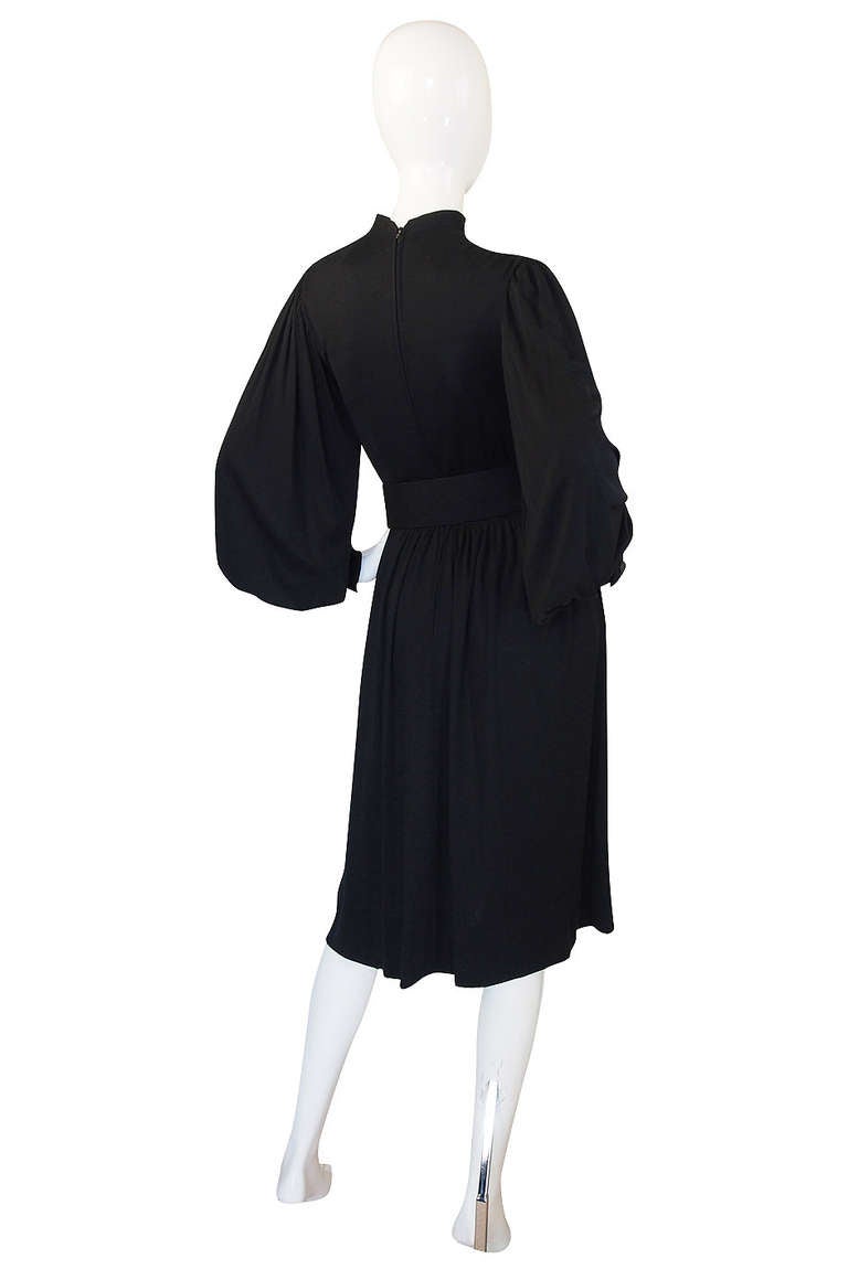 Similar to the silk version I have had of this dress, this sleek black jersey dress is the epitome of chic. The finish is incredible and it is very well tailored, beautifully constructed and the jersey it is constructed from lends itself perfectly
