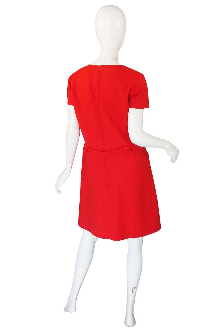 This is a fabulous, early 1980s example of Courreges that has all the feel and mod appeal of an earlier piece! It is in excellent, condition and really a great piece with lots of appeal. It is cut in a classic shift with lots of great seaming