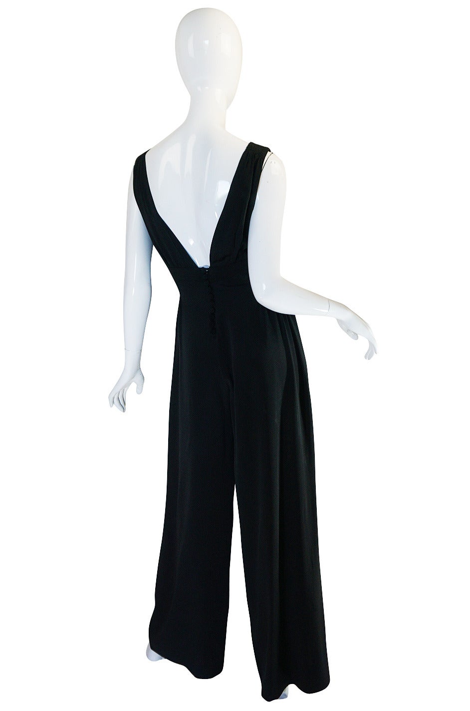 This fabulous jumpsuit by one of my favorite of the British labels - the iconic and early Quorum label where Ossie Clark first began designing! Designs from this label ruled during the mid-sixties British scene and have a sexy, easy way about them.