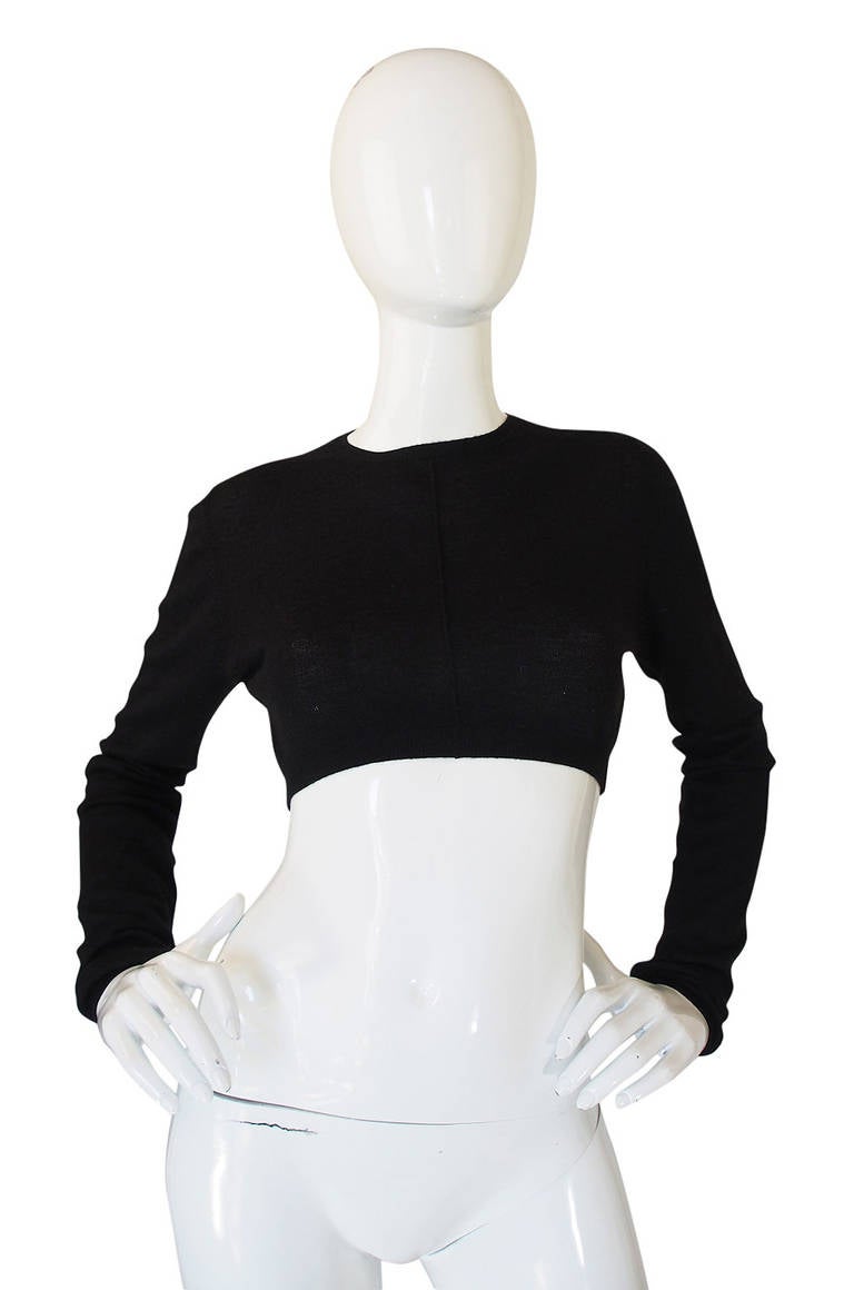 If you can wear a crop top then what better choice than one from Prada in the finest black cashmere and silk? It is unbelievably soft and feels dreamy on. The short, just below the bodice crop is balanced out by the extra long sleeves. You could use