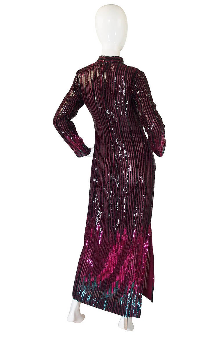 A light silk chiffon base makes this gown much lighter on than it may appear with that profusion of sequins. The way it is cut is very old Hollywood with full coverage form neck to hem. This allowed Ruben to take full advantage of the fabric and