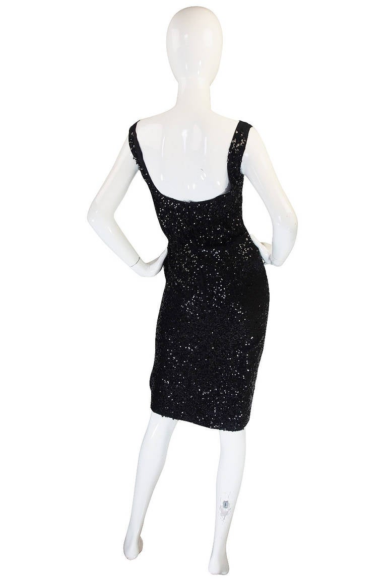 A very fine sequin wiggle dress by Ceil Chapman is a treasured find. If you love it in the photos you will be  astonished when you actually get to see the level of construction and work that would have been done to so densely hand apply all the tiny