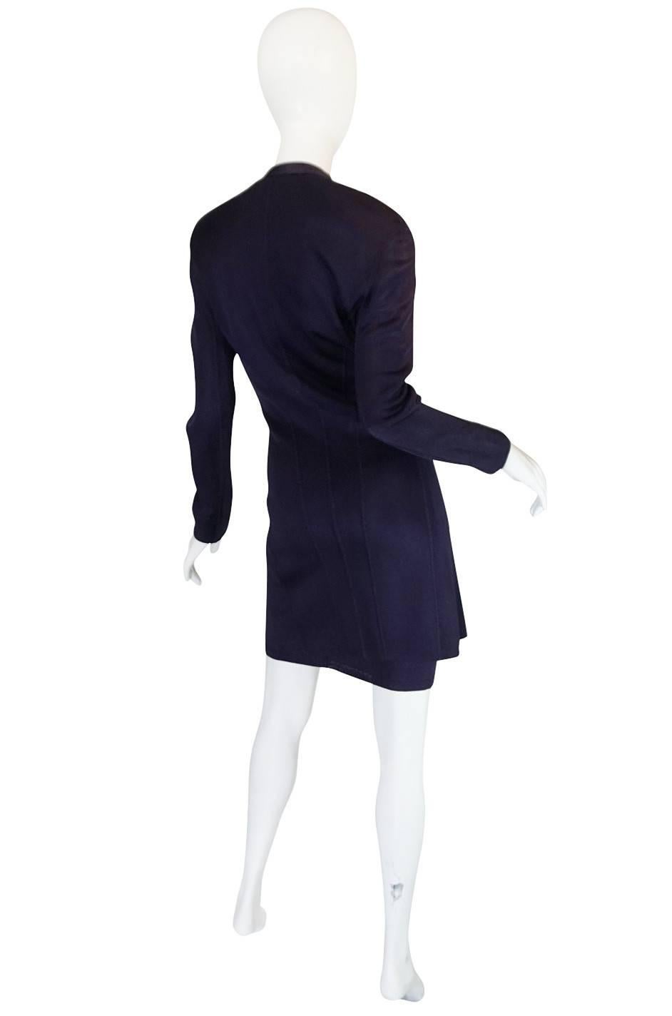 

In some of his earlier collections Azzedine did show more color and this is a great example of that. Both pieces are made from a fine and slinky knit with a polished sheen finish that has been dyed the perfect shade of purple. The inner dress is