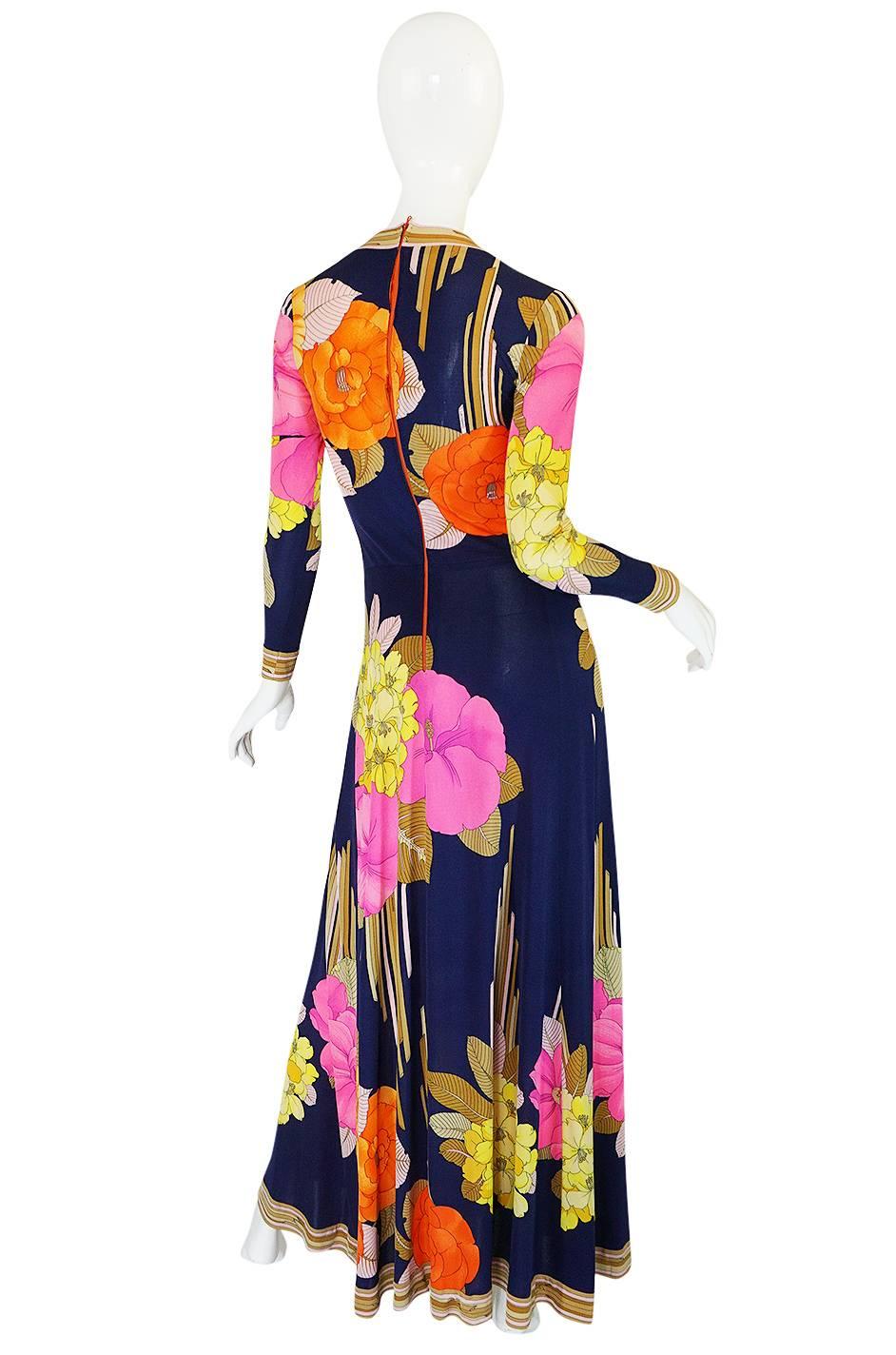 

A fabulous 1970s Leonard maxi dress made of his signature silk jersey fabric that gives these dresses the perfect drape and fit. Each of his designs were made of customs designed fabrics and during this time period especially they were all the