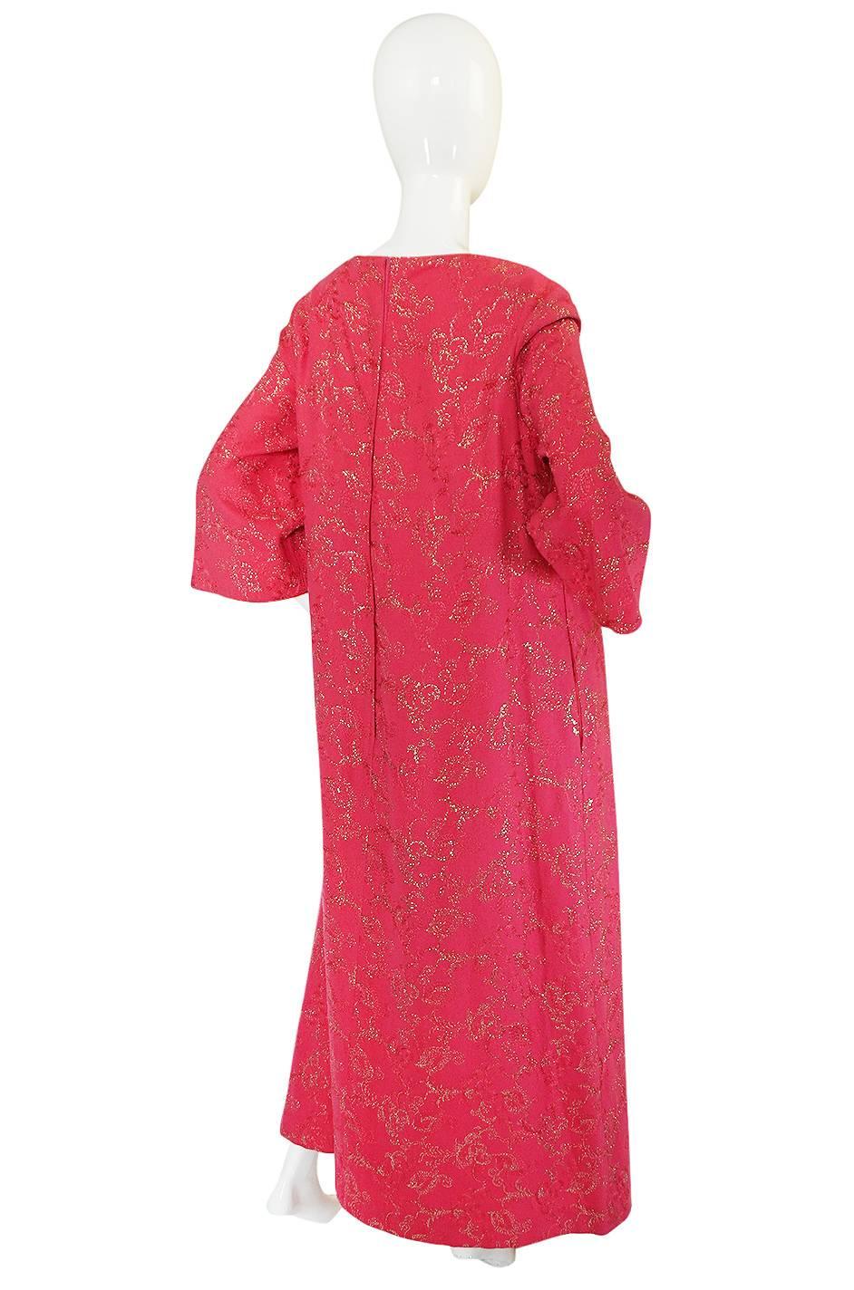 

This caftan dress is just amazing. It's made of a beautiful pink very light wool mix upon which are two patterns - one embroidered in a matching pink thread and the other in a gold lame thread. The effect of the gold on the pink is stunning and