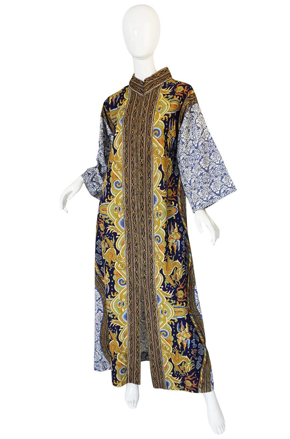 

In the seventies caftan fever was at an all time high and many of the top designers of the day designed options for their clients who still wanted to wear a brand name. This fabulous multi-print piece is from Bill Blass and combines his