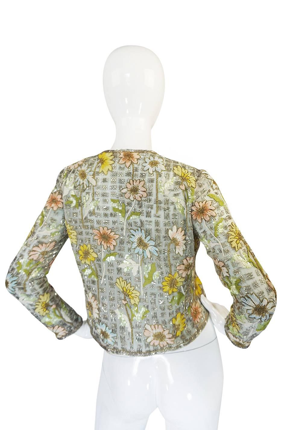This little embroidered and beaded silk jacket from the Chanel Couture Atelier is absolutely divine and a once in a lifetime find. In all of my years of having some of the finest pieces of vintage couture pass through my hands I can easily say that