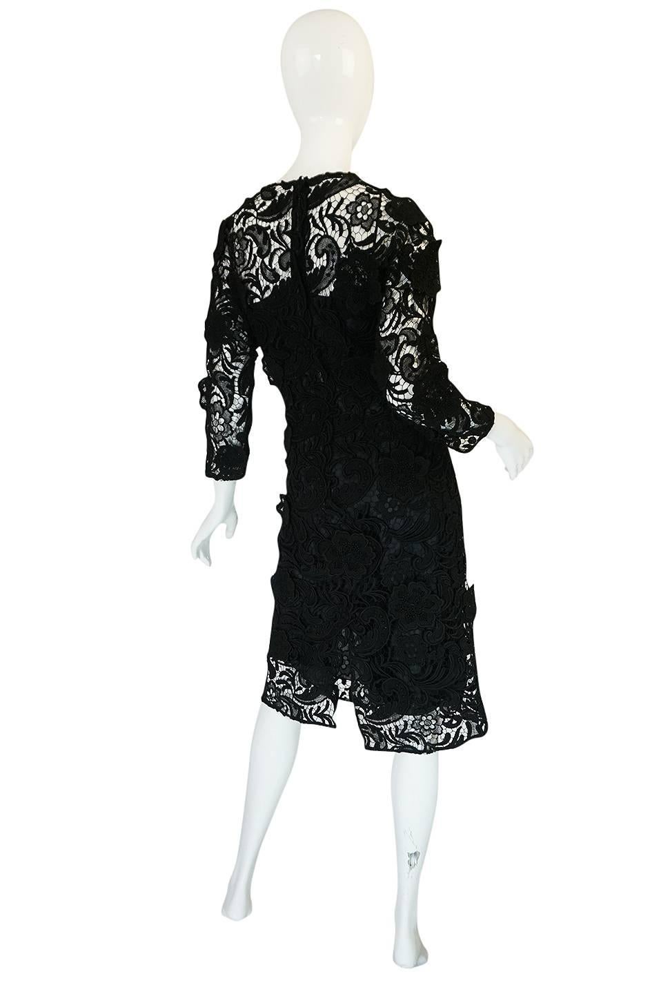 Yes, this is that lace dress from the Fall 2008 runway. When this came out it sold out before it hit the stores and was wait-listed world wide. And its still as good and wearable now. Maybe even more so as Miuccia always seems to design ahead of the