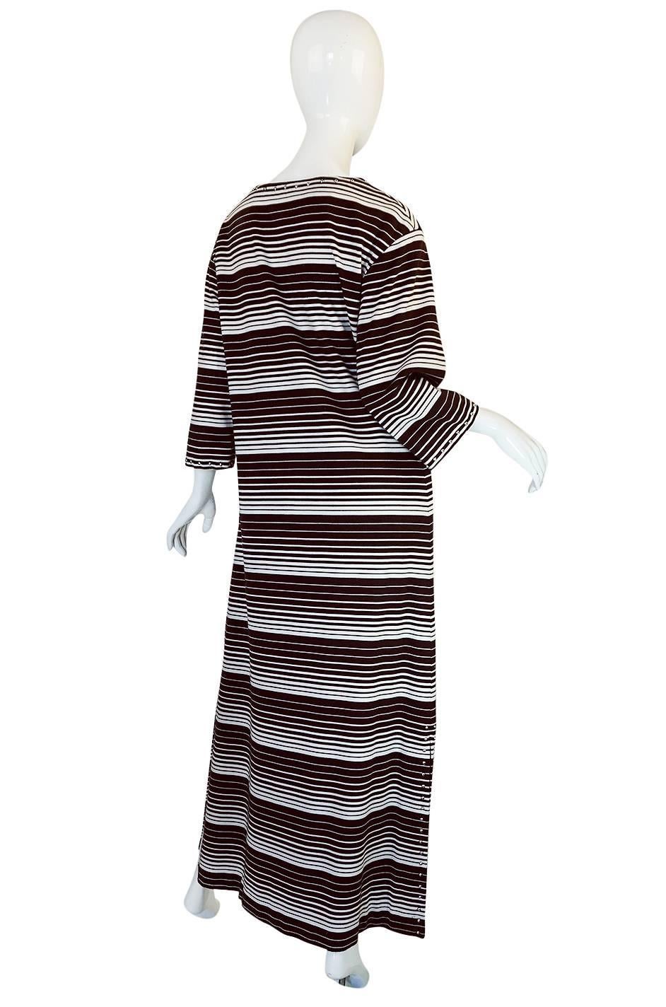 The graphic feel that the bold brown and white striping give this dress is amazing and the loose and easy cut make it incredibly comfortable to wear. It is constructed of a light, cotton-wool mix that has a soft, almost T-shirt feel to it. This