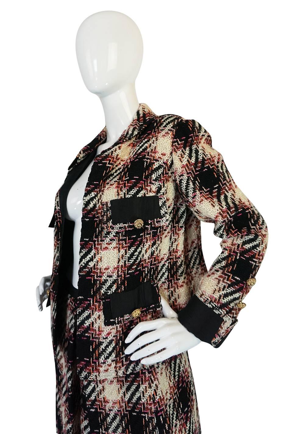 Black 1960s Unlabelled Chanel Haute Couture Boucle Suit