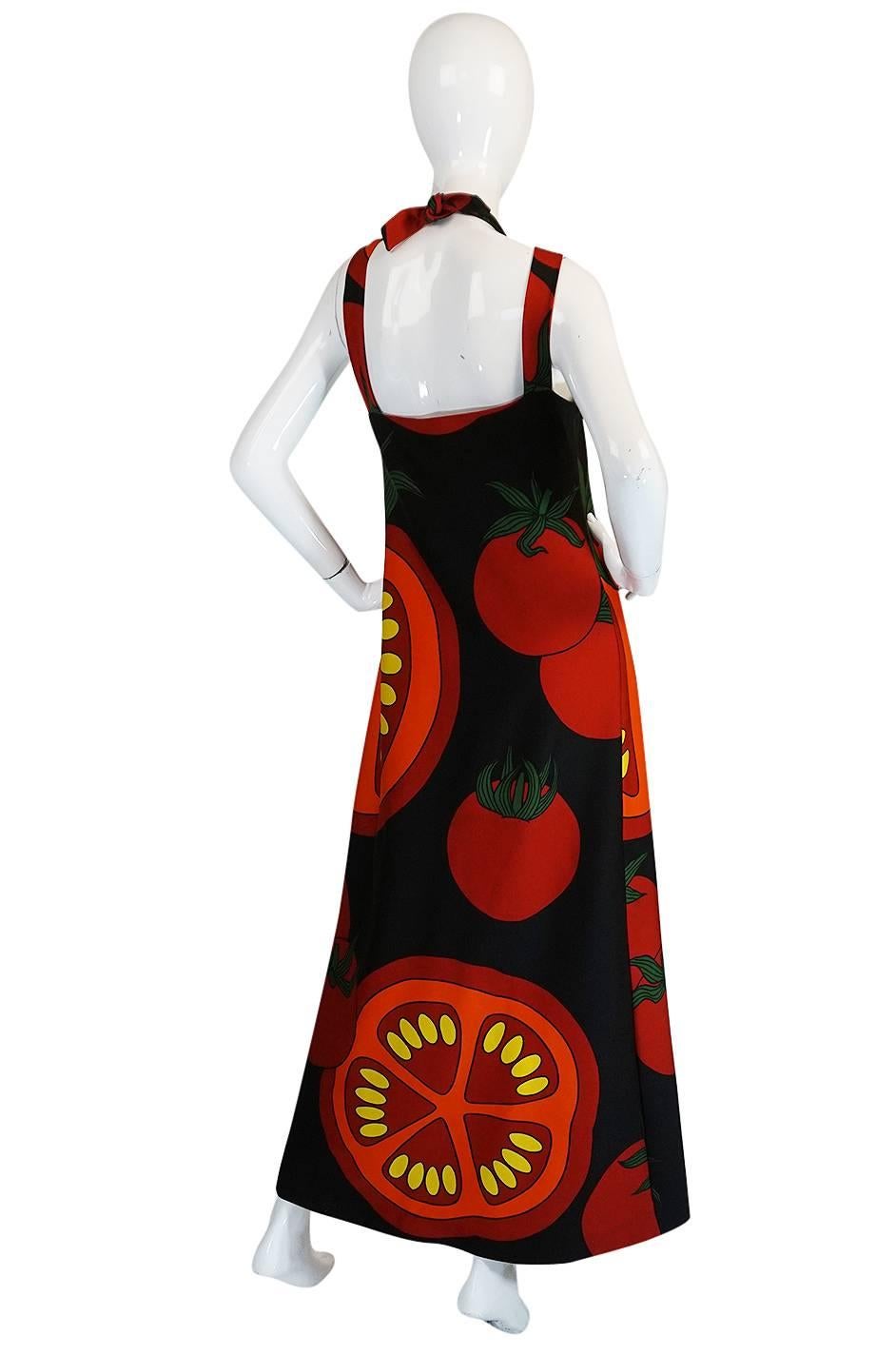 

The early seventies saw the house of Lanvin dive full on into the bright and riotous colors of the era and they produced some of the best of the bright, full length maxi dress that you could ask for. This one is particularly great with it's