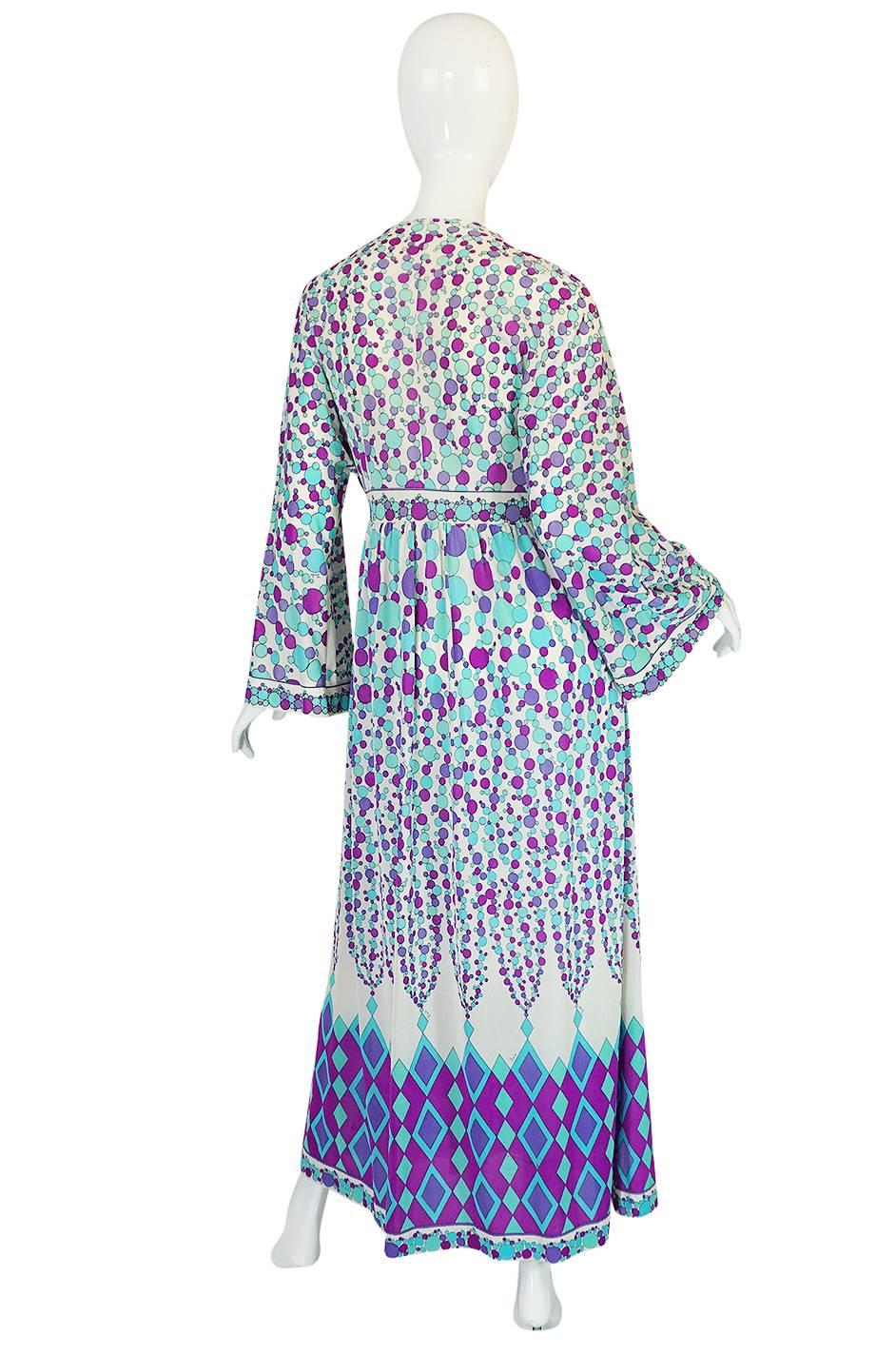 I love this bright little Emilio Pucci for Formfit Rogers zip front caftan robe. It was of course meant to be hostess level lingerie when it was originally made but would be completely wearable as a maxi dress, or can be used as a chic beach cover