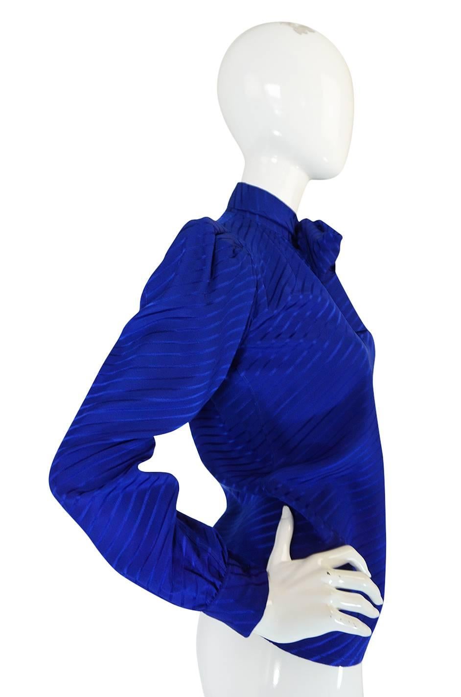 1970s Yves Saint Laurent Beautiful Blue Silk Tie Neck Top 1