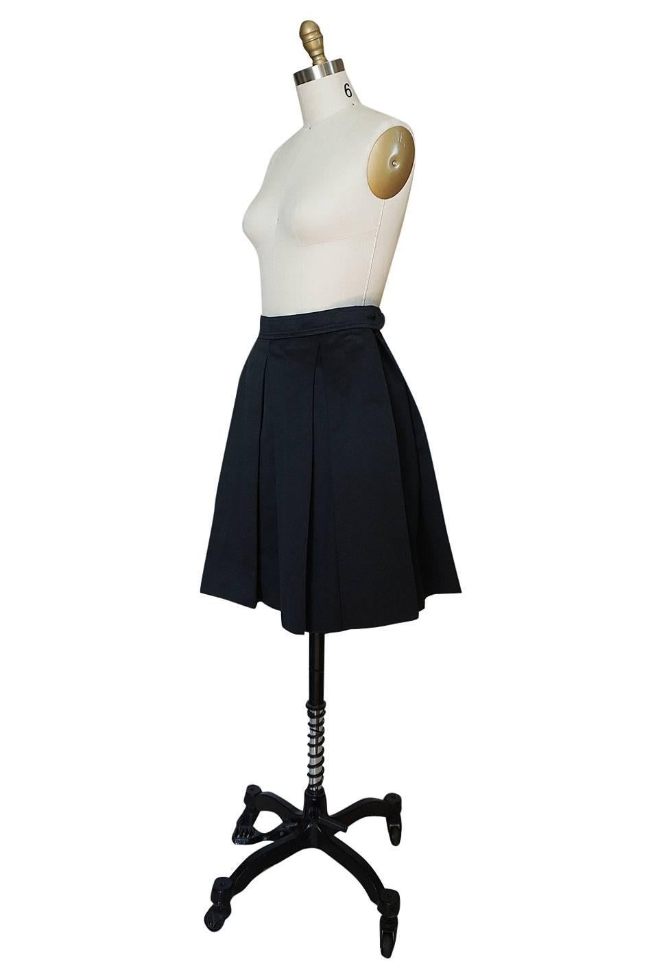 1980s Yves Saint Laurent Flat Pleated Black Mini Skirt In Excellent Condition In Rockwood, ON