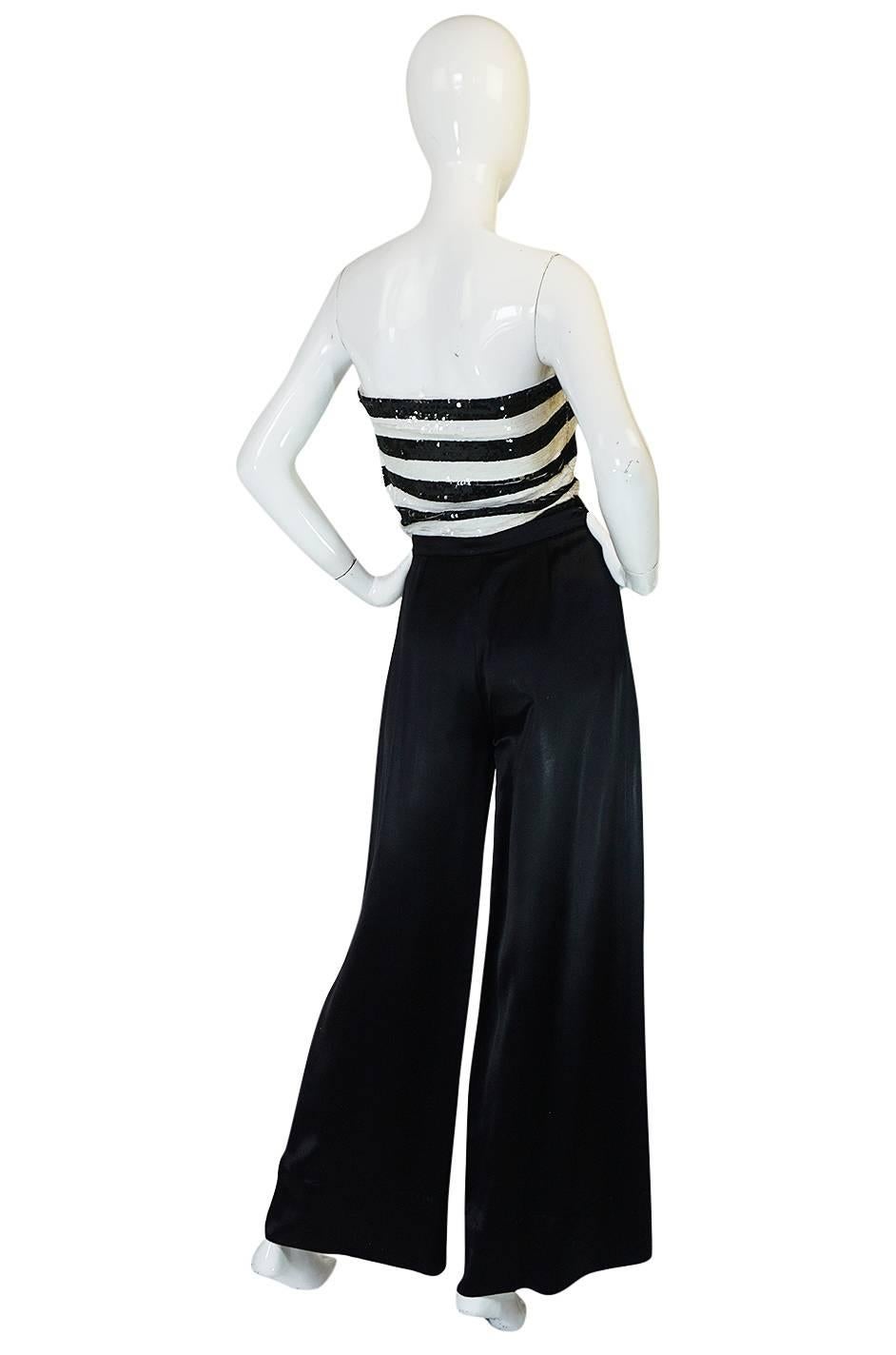 Yves Saint Laurent was the master of making simple pieces into something luxurious and fine and here we have a fabulous example that is the very definition of that aesthetic. The 1966 Haute Couture collection featured sequin striped pieces and this