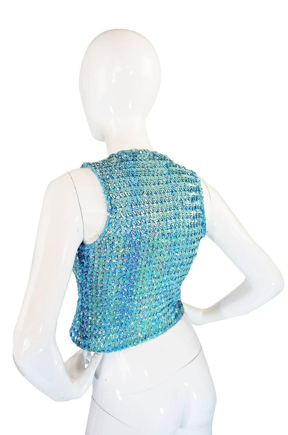 These were all the rage in the early 1970s and the Biba versions are the best out there. This one is amazing. It is an original Biba sequin vest done in the prettiest baby blue. I have a few variations of this in the shop right now and each is as