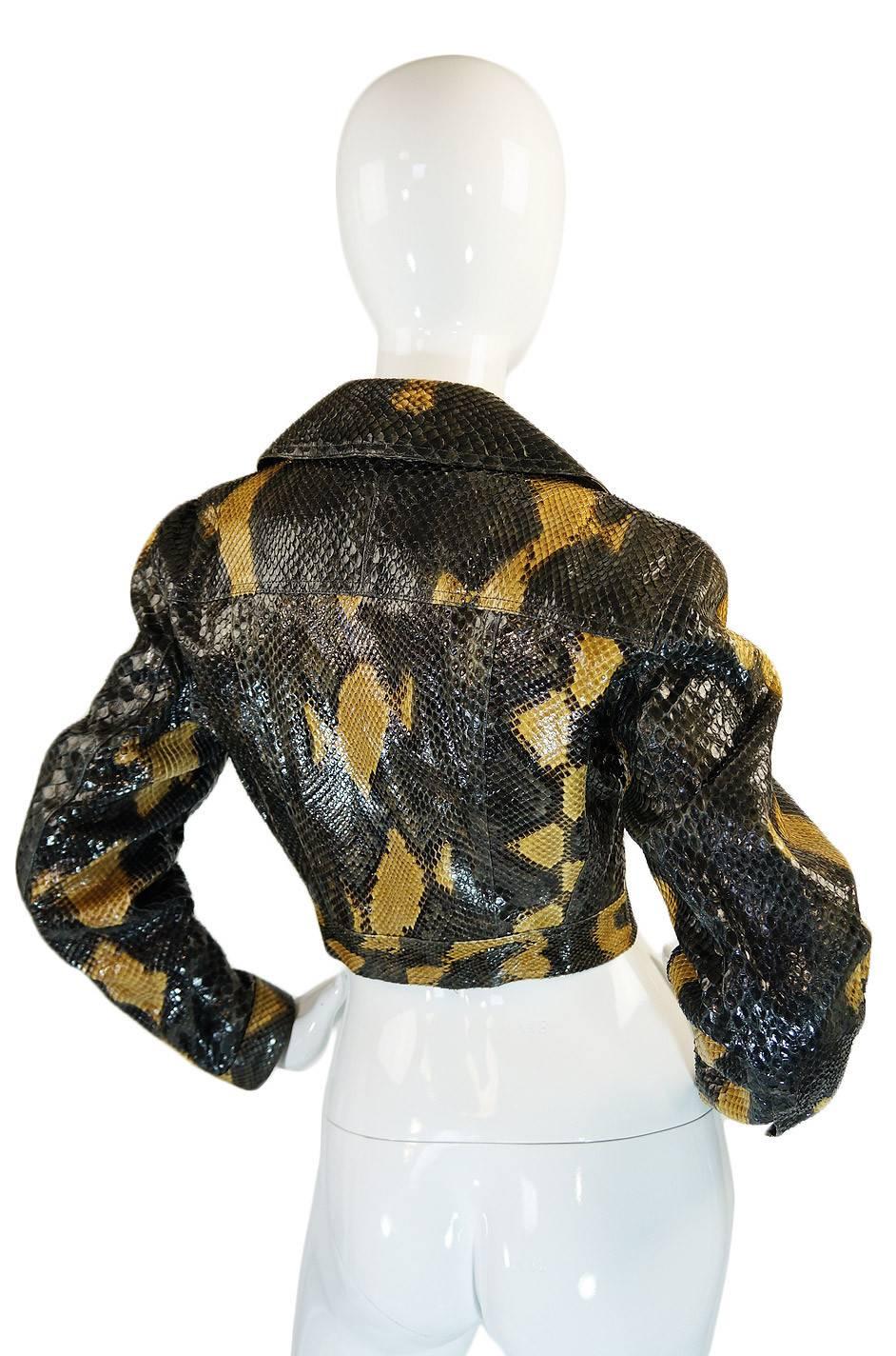 

This is an amazing and very rare, very limited production Azzedine Alaia custom made "couture" level python skin biker jacket. In all probability there were only one or two of these made in the entire world and this certainly this is