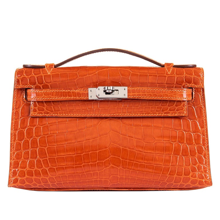 Hermes Mini Kelly Crocodile Clutch in Orange with Silver Palladium