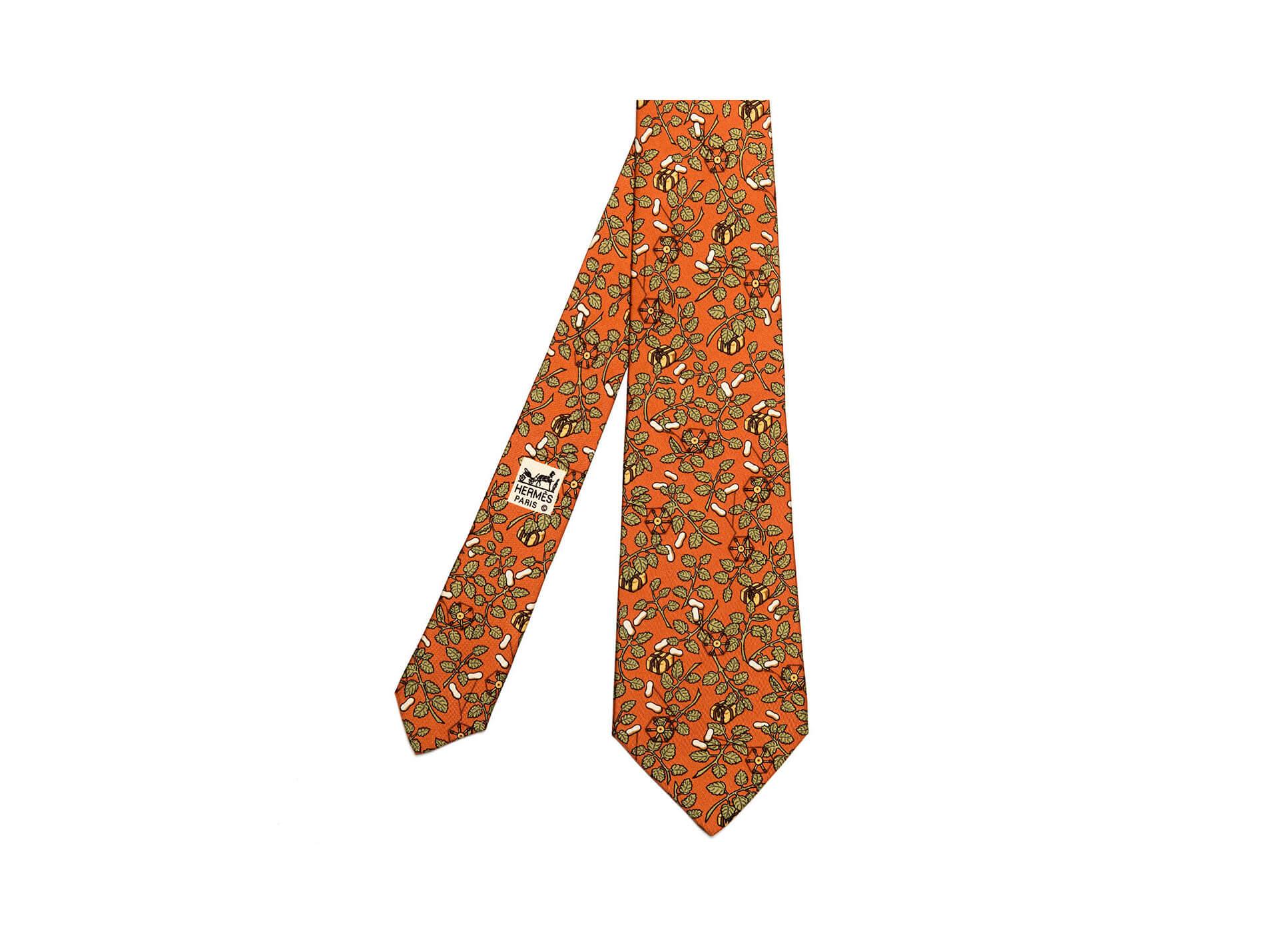  A Rare Hermes Vintage Silk Tie. 'Cotton & Cadeaux' with it's intricate design is in absolutely pristine condition.