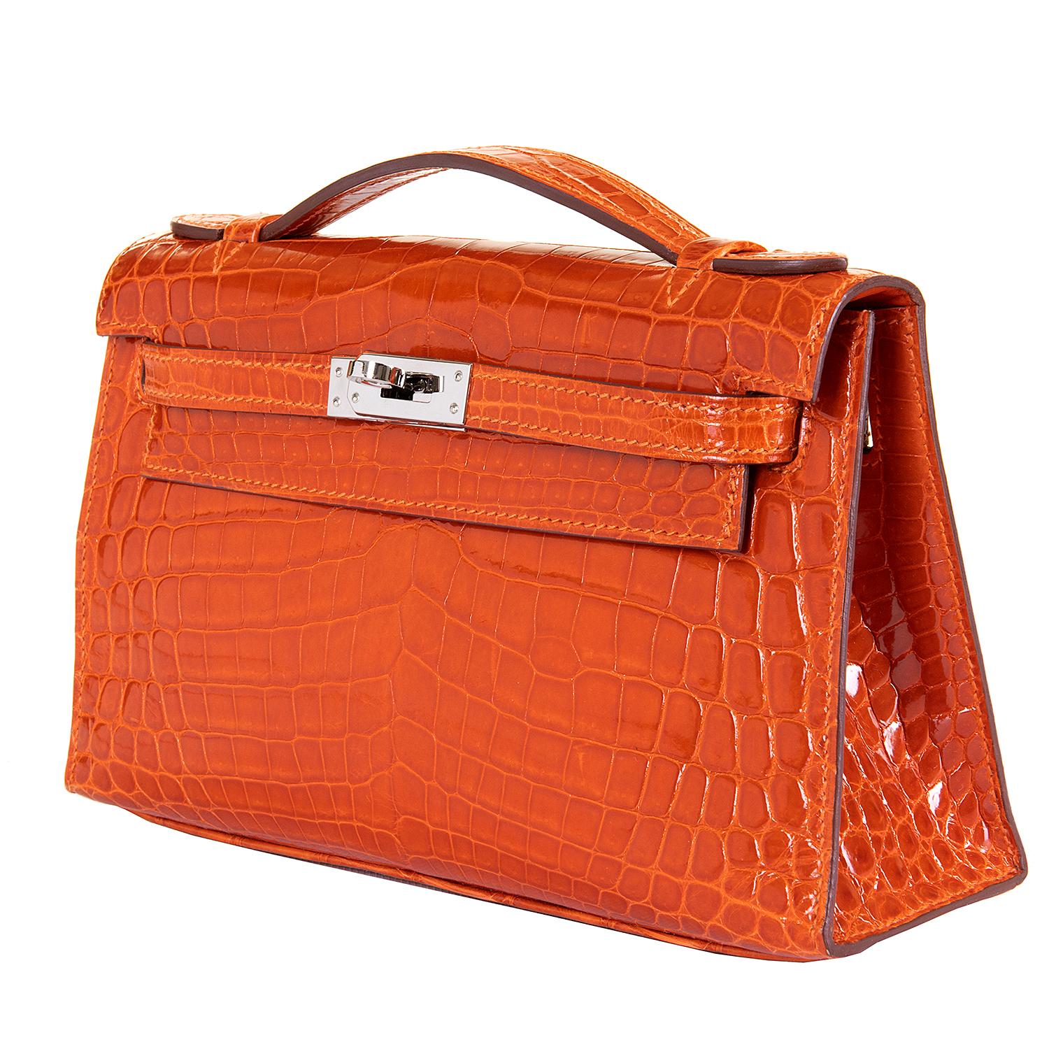 Women's  Hermes Mini Kelly Crocodile Clutch in Orange with Silver Palladium Hardware 