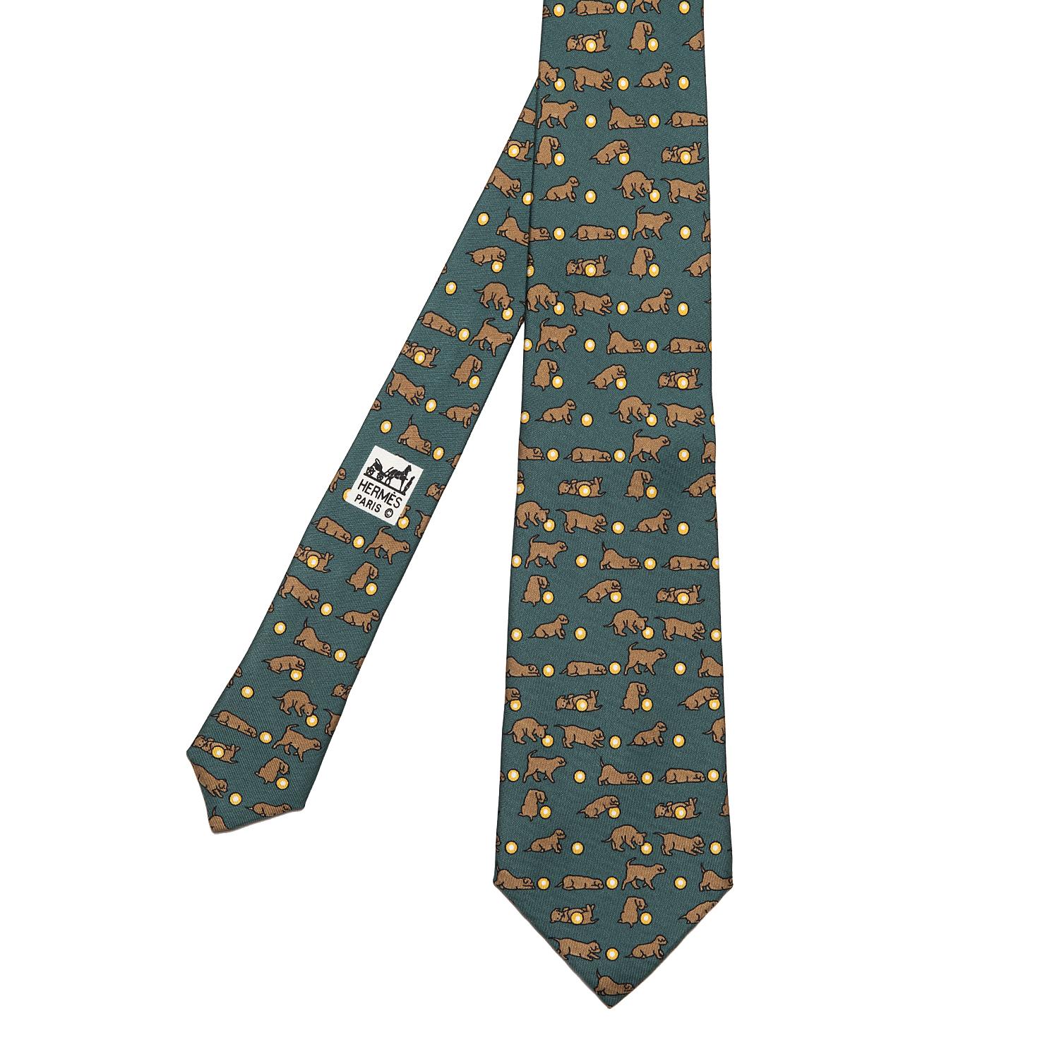 'Playful Pups' we've all met one, know one or have one ??? This delightful Hermes Silk Tie is in absolutely pristine condition. The motive is on a Malachite Green ground.