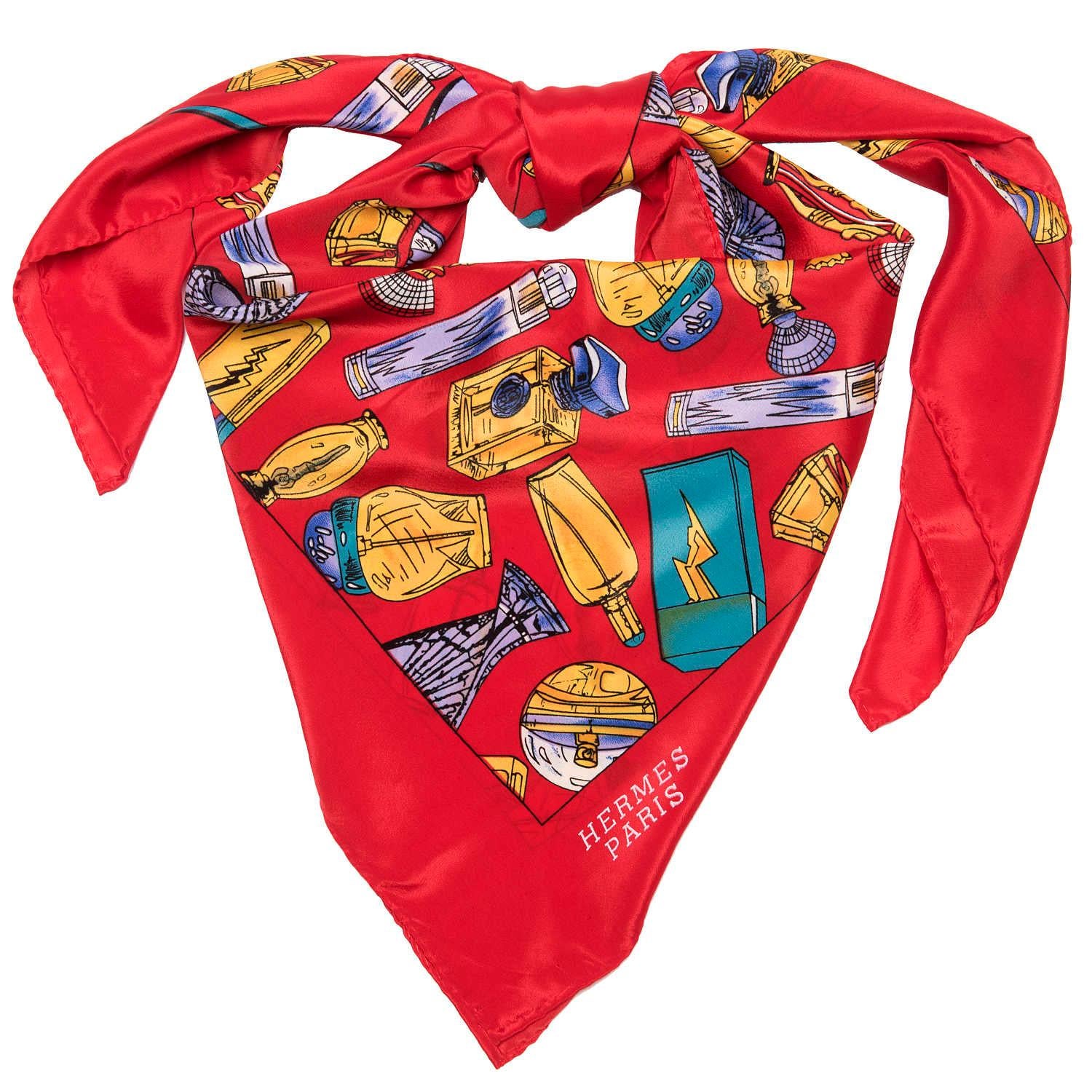 Superb Hermes Silk Scarf with a red border, with the perfumes of the world illustrated in multicoloured designs. In excellent condition, with no tears, holes, marks or odours.