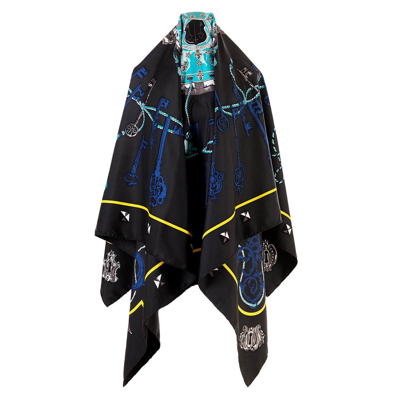 'Les Clefs' by Caty Latham is a truly beautiful Hermes silk shawl, scarf, in pristine 'store-fresh' condition. On a grey/black ground, overlaid with a design using turquoise, grey, brown, navy blue and yellow colours. This very elegant piece is a