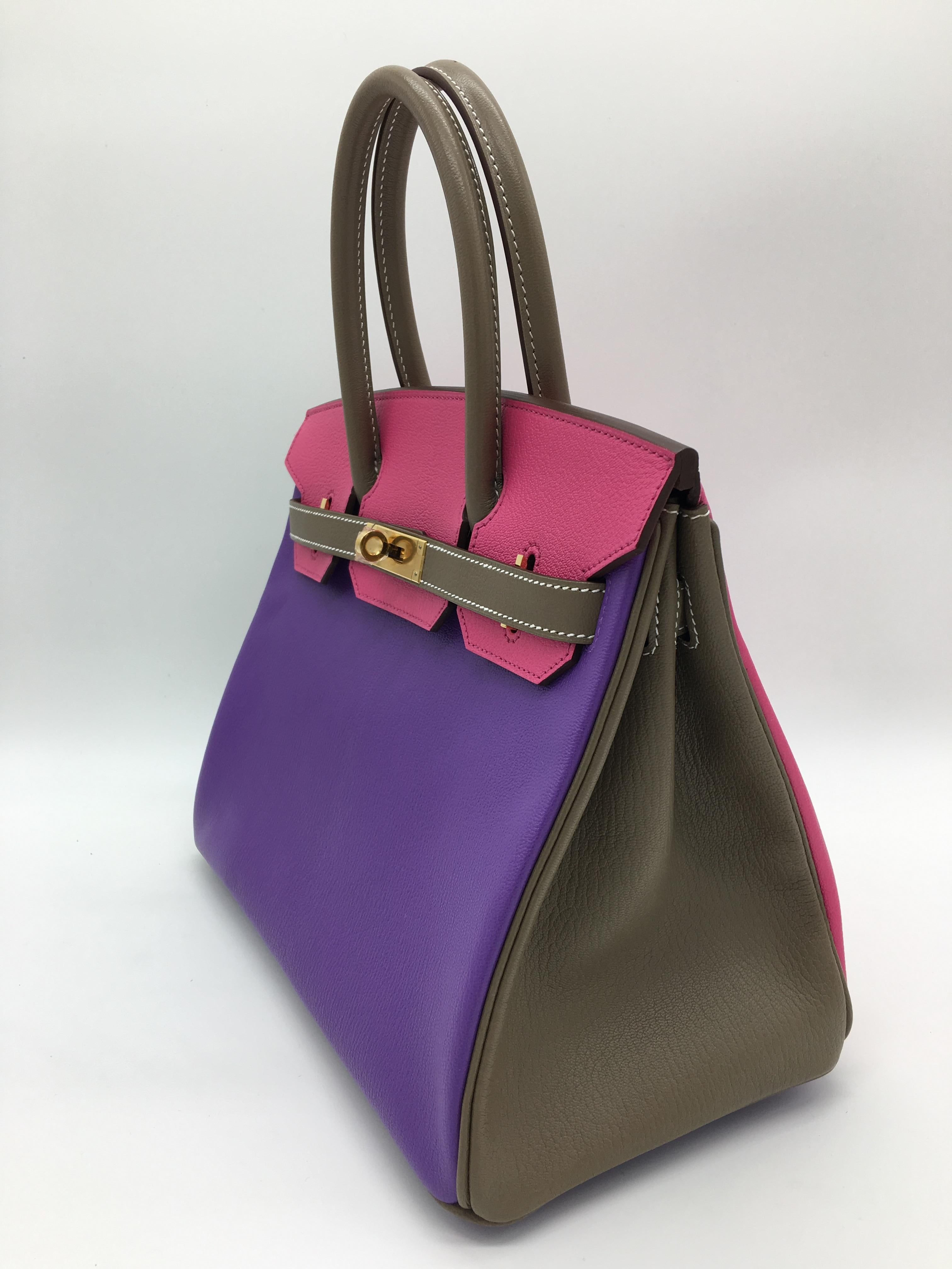 A fantastic HSS Birkin in three great colours – the front of the bag is in Parme, a soft purple which contrasts brilliantly with the super bright Rose Tyrien on the back and the flap, whilst the handles, sides and strap of this Birkin 30 are in soft