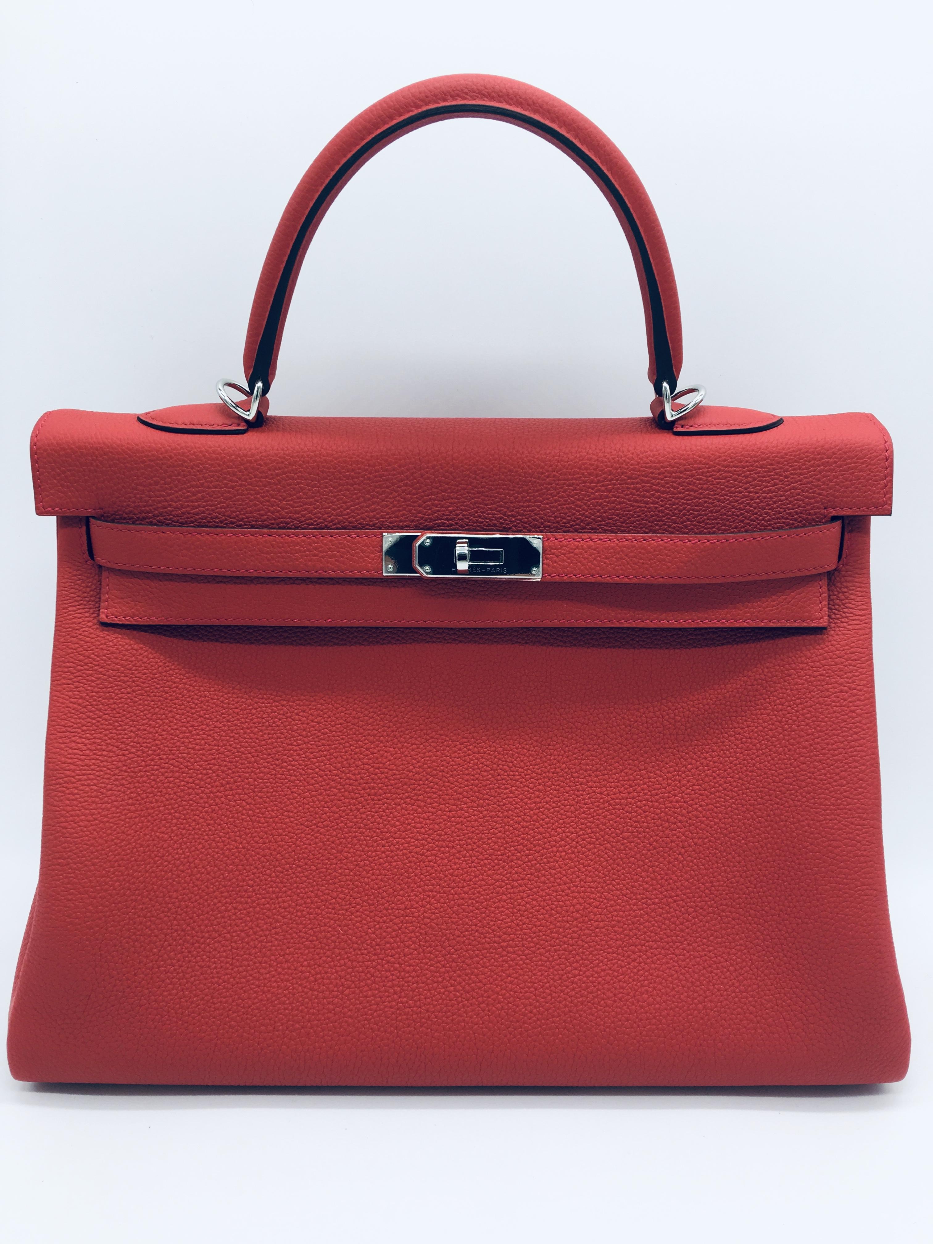 Hermes produces some fabulous reds and Geranium is no exception – we love it! Bright red with a slight orange undertone it’s perfect for bringing a splash of colour to any outfit, any time. This is an X stamp 35cm Kelly in Togo Leather with