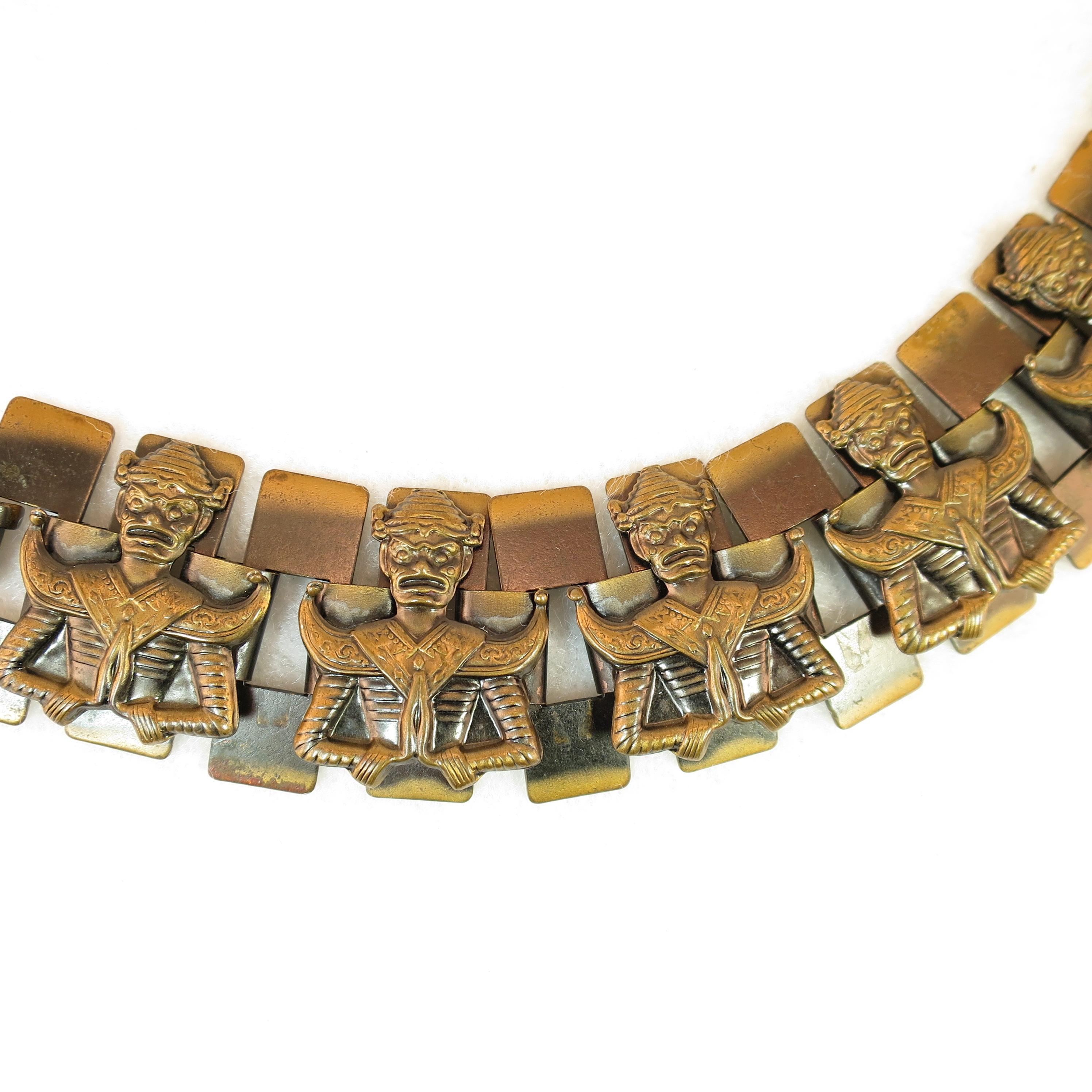 Offered here is a Mid-Century Modern antiqued copper bracelet from the 1950s. This supple linked bracelet consists of rectangular panels with open centers, joined by wide flattened connectors. Atop alternating links are three-dimensional raised