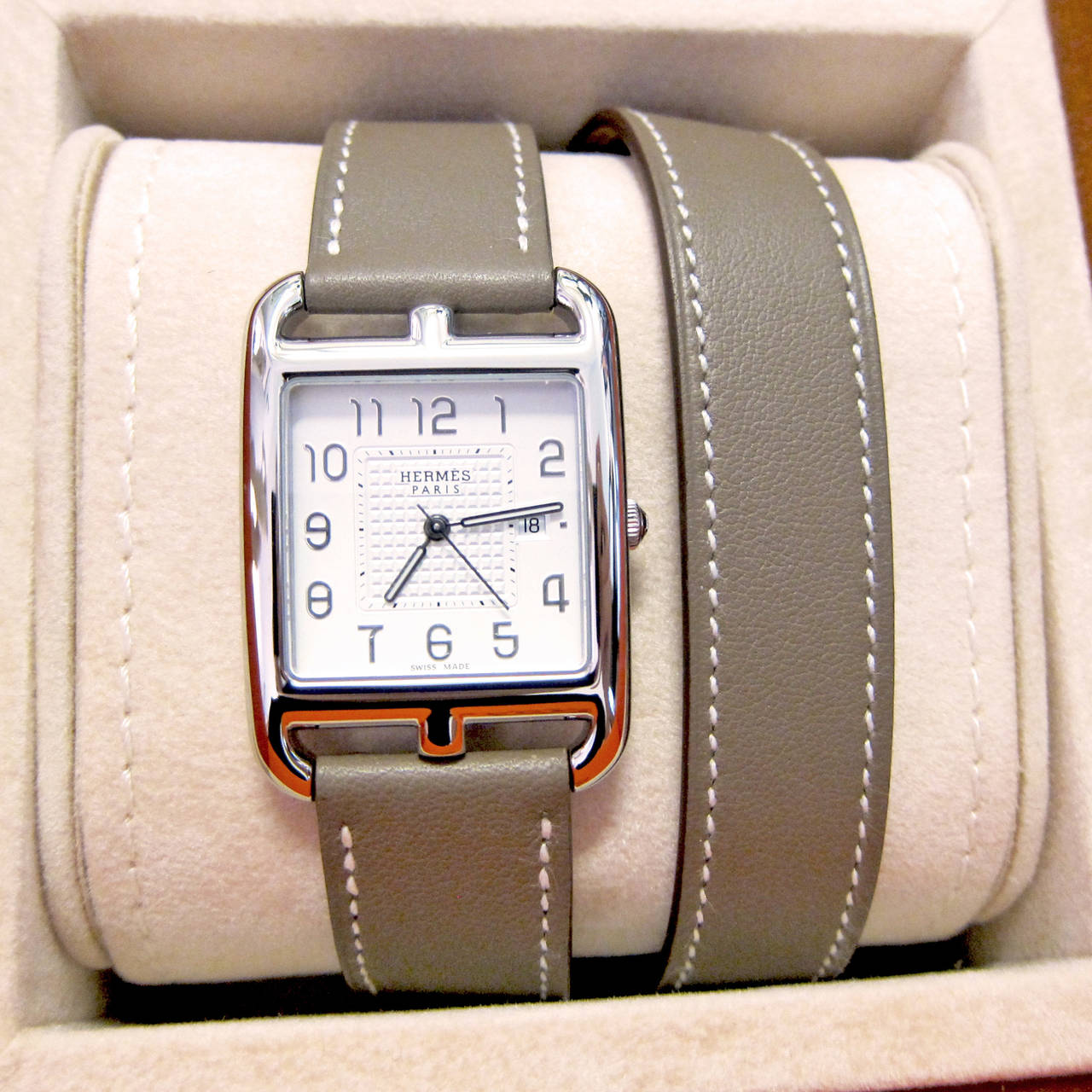 Hermès Etoupe Cape Cod Double Tour GM Auto Double Tour Watch

Long Double-Tour Etoupe (Taupe) Calfskin Leather Strap
GM Silvered Dial 29x29mm, Quartz Movement
Perfect Gift - store fresh 
Brand New in Box.  Never Worn.  R stamp.
Comes full set