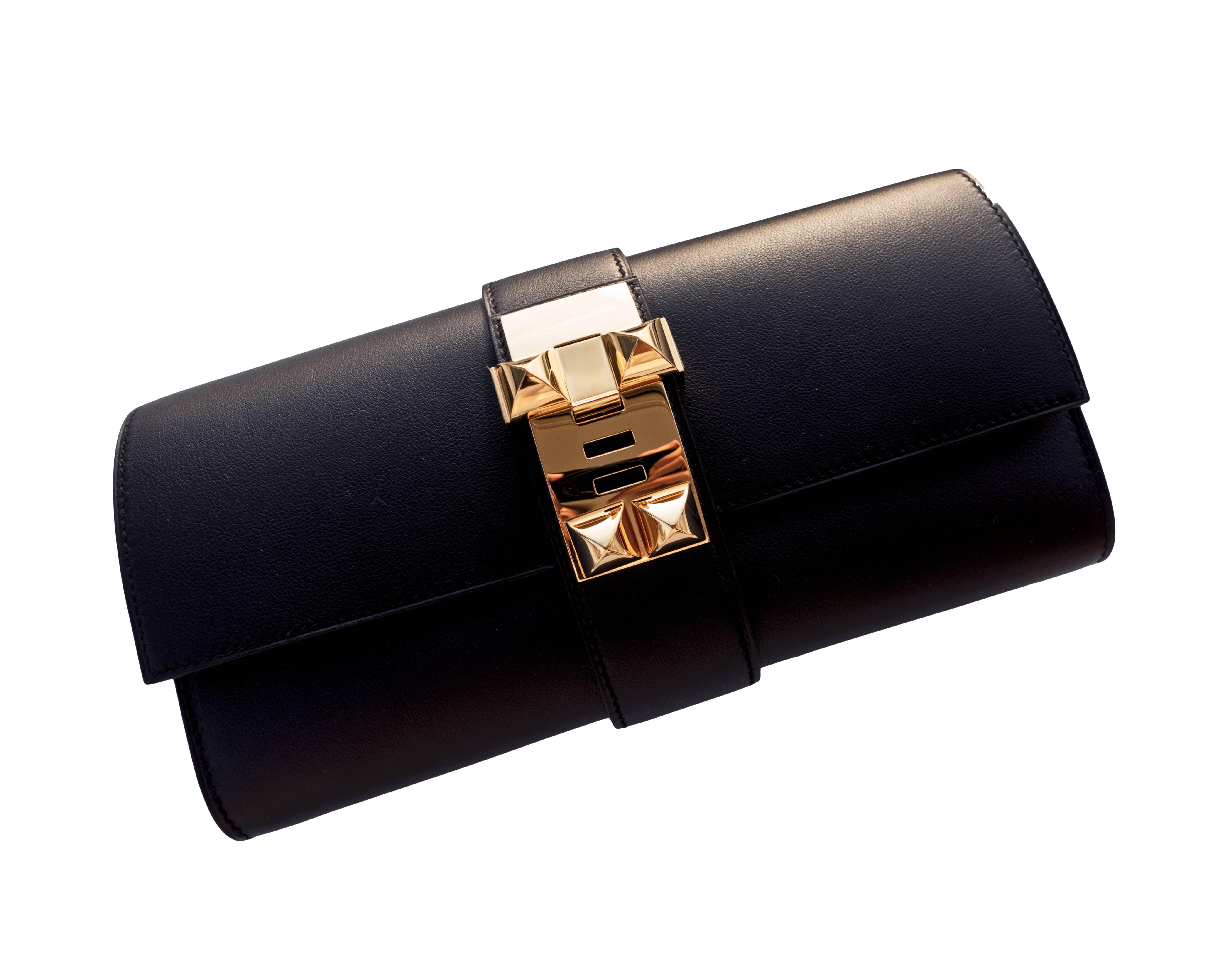 Hermes Black Medor Pochette 23cm Clutch Gold Hardware Bag Elegant
NEW or Never Worn.
Perfect gift!  Comes full set with protective felt cloth, Hermes sleeper, Hermes box, and Hermes ribbon.
Very rare production of Black Medor which is so rich and