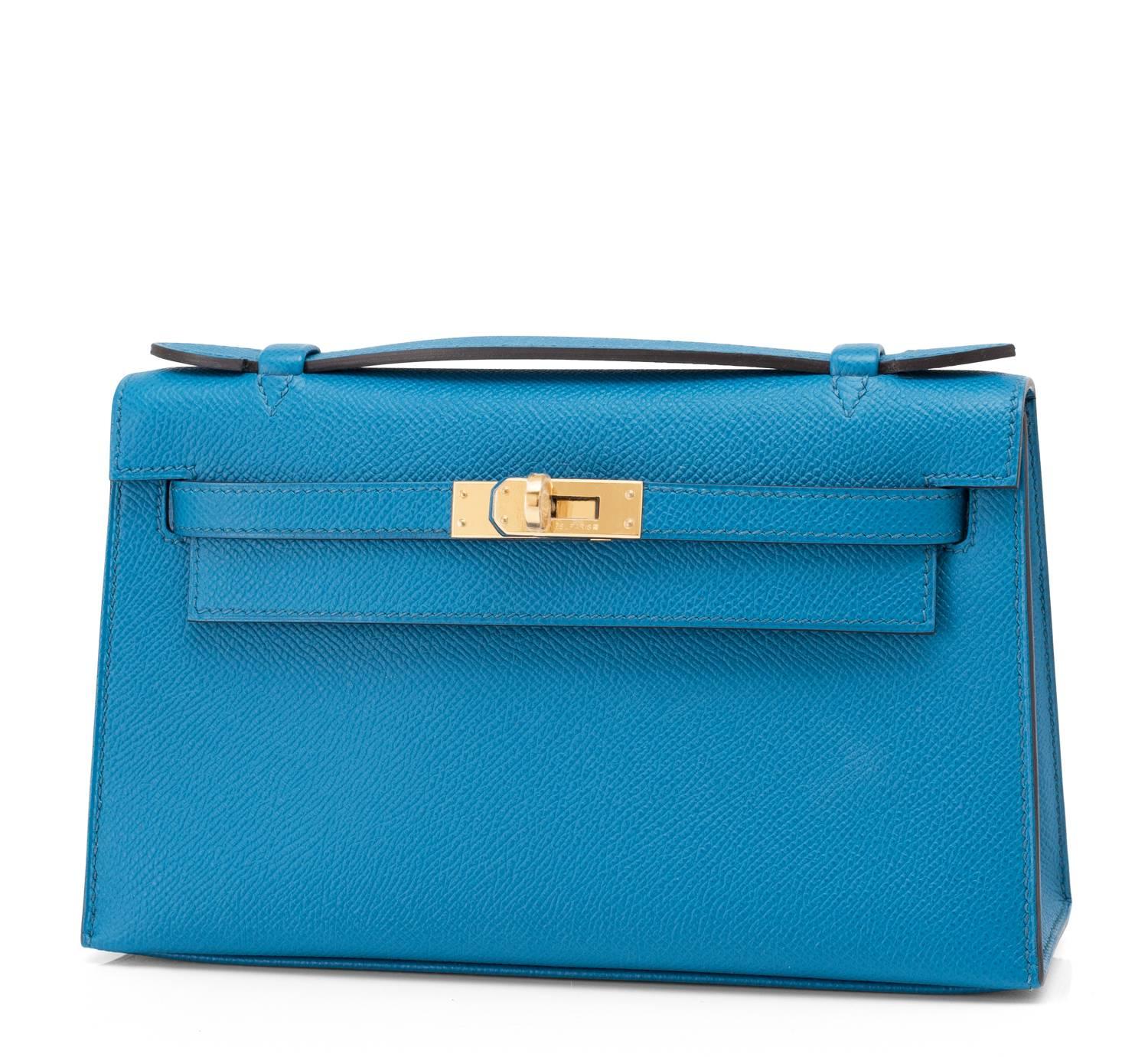Hermes Blue Izmir Gold Kelly Pochette Epsom GHW Clutch Cut Bag 
Brand New in Box. Store fresh. Pristine condition (with plastic on hardware)
Perfect gift! Coming in full set with Hermes sleeper, box and ribbon
Blue Izmir set against gold hardware is