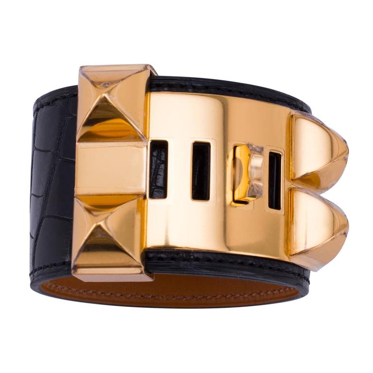 Hermes Matte Black Crocodile Collier de Chien Bracelet 
Store fresh. Pristine condition (with plastic on hardware).
Perfect gift! Comes full set with Hermes velvet pouch, box and ribbon.
Matte black crocodile is fabulously chic and much rarer than