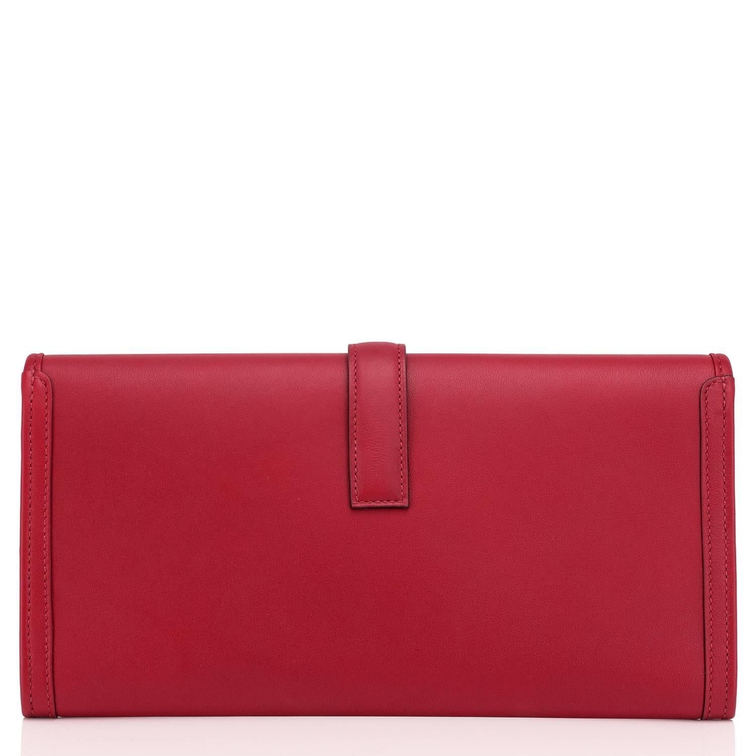 Hermes Rouge Grenat Jige Elan Clutch 29cm Red Garnet Jewel 
Brand New in Box.  Store fresh. Pristine condition.
Perfect Gift! Comes in full set with Hermes dust bag and Hermes box. 
The latest color Rouge Grenat is a must-have "Garnet"