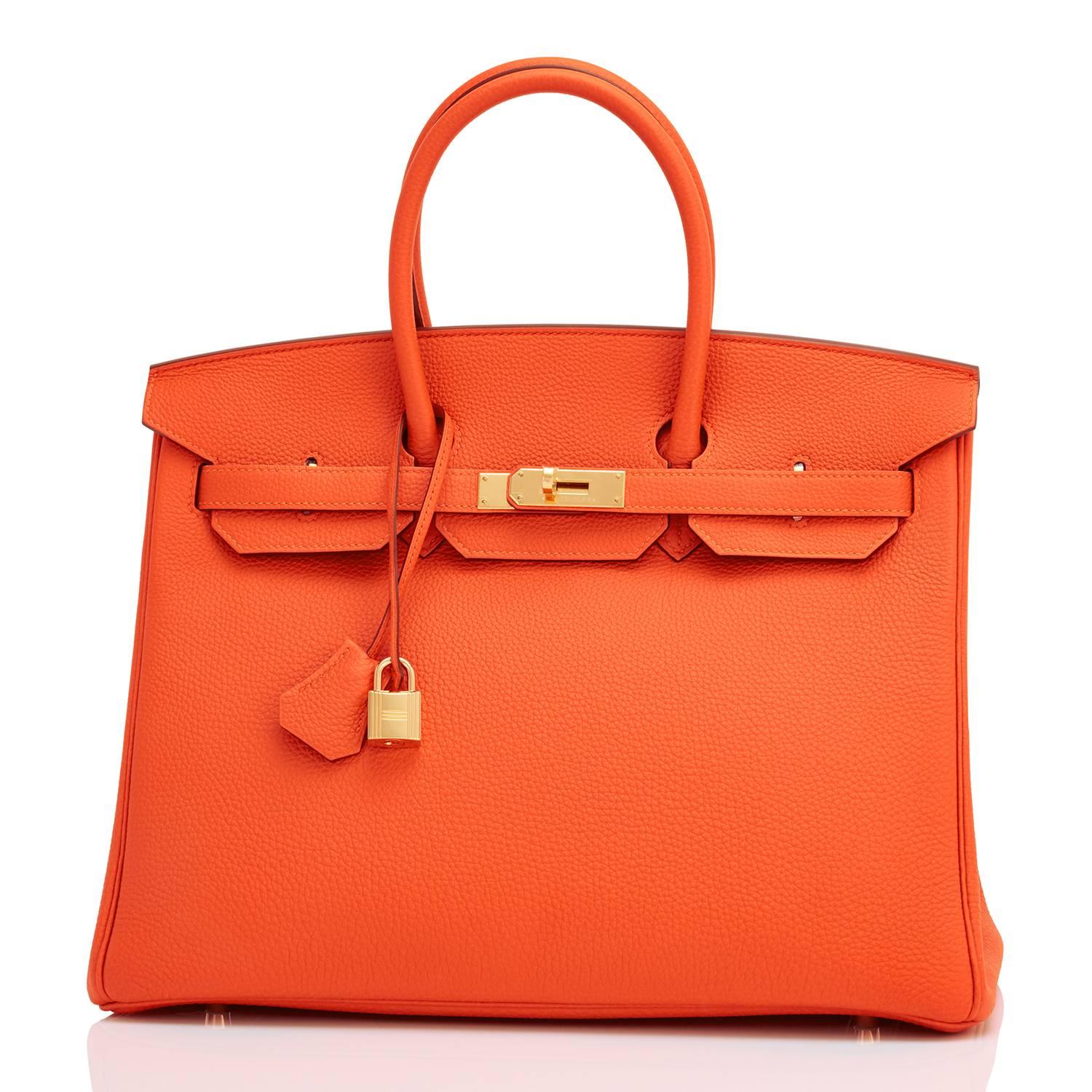 Hermes Classic Orange 35cm Birkin Bag Gold Hardware 
Extremely rare find in Pristine Condition (with plastic on hardware). 
Perfect gift! Comes in full set with lock, keys, clochette, sleeper, raincoat, and Hermes box. 
This is the highly coveted