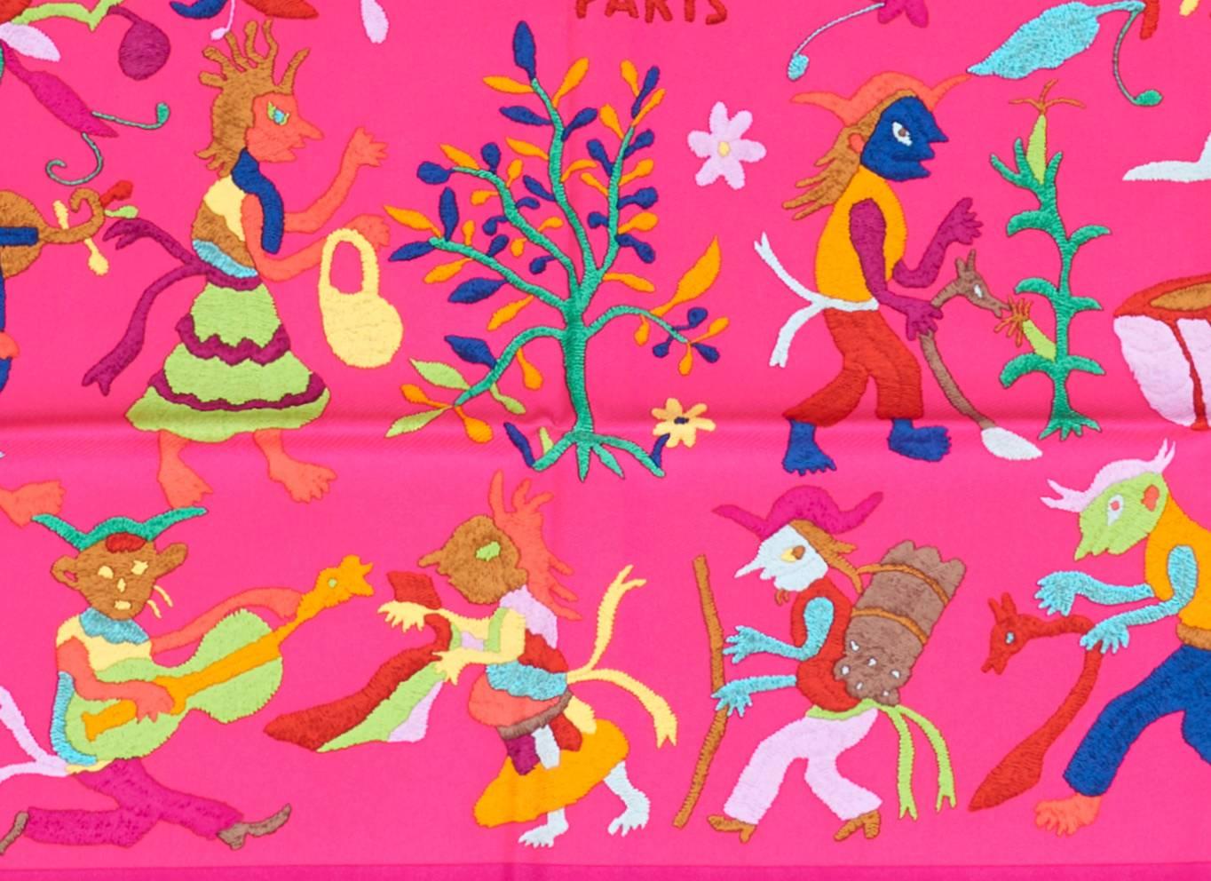 HERMES Din Tini Ya Zue Fuchsia Pink Silk Scarf Carre 90cm Gorgeous
Perfect gift!  Comes with Hermes box and ribbon.
Designed by Mexican artist Jose Vicente Ezequiel.
Amazingly vivd colors show whimsical human and animal characters.
Natural motifs