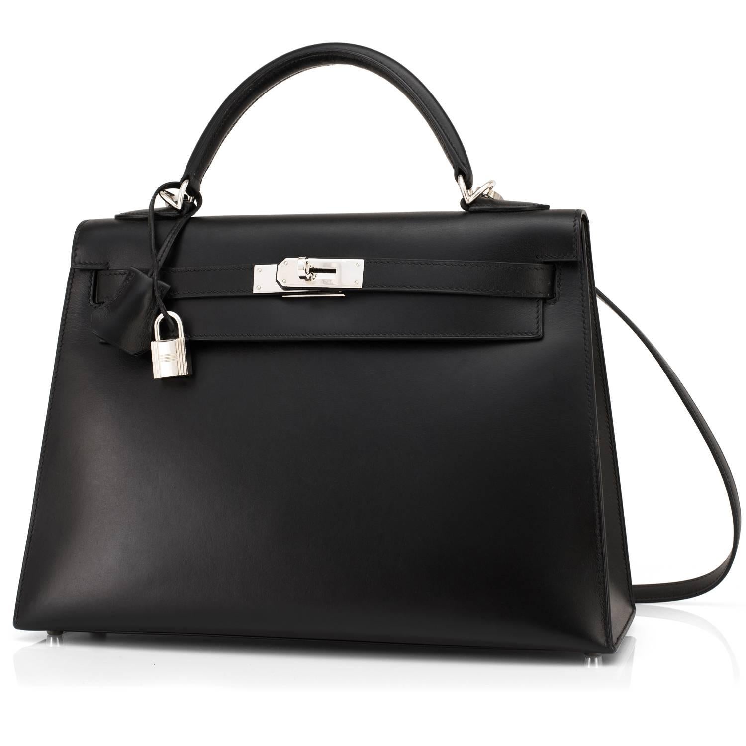 Hermes Black Box Kelly 32cm Shoulder Bag Palladium Hardware 
Black Box Kelly is modern and sexy set with fresh palladium hardware.
In a perfect 32cm Sellier which holds almost as much as a Birkin 30, while lending a flawless architecture to any