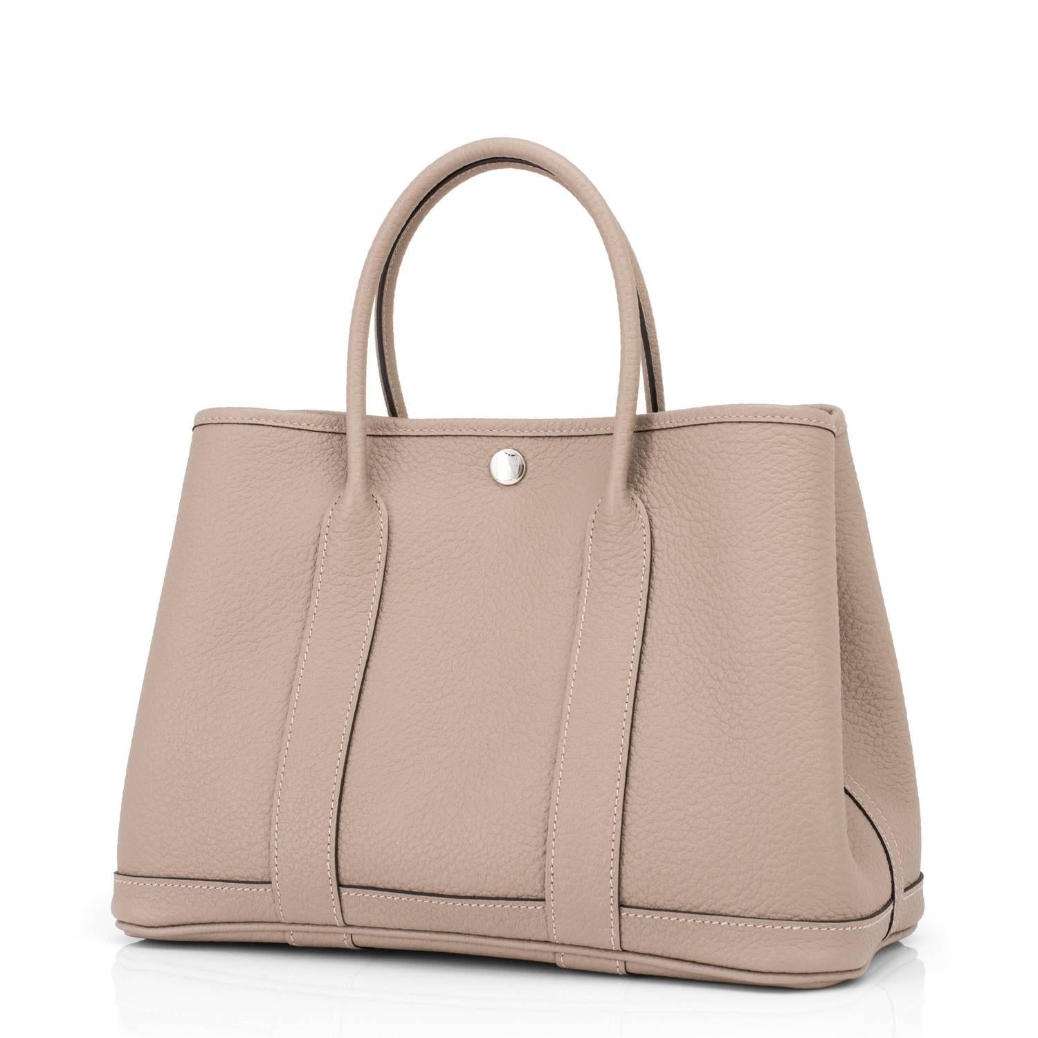 Hermes Gris Tourterelle TPM Garden Party Dove Grey Garden Party 
Brand new in box. Store fresh. Pristine condition. 
Perfect gift! Comes with original Hermes sleeper and box.
Very limited in production now, Gris Tourterelle is the most sought-after