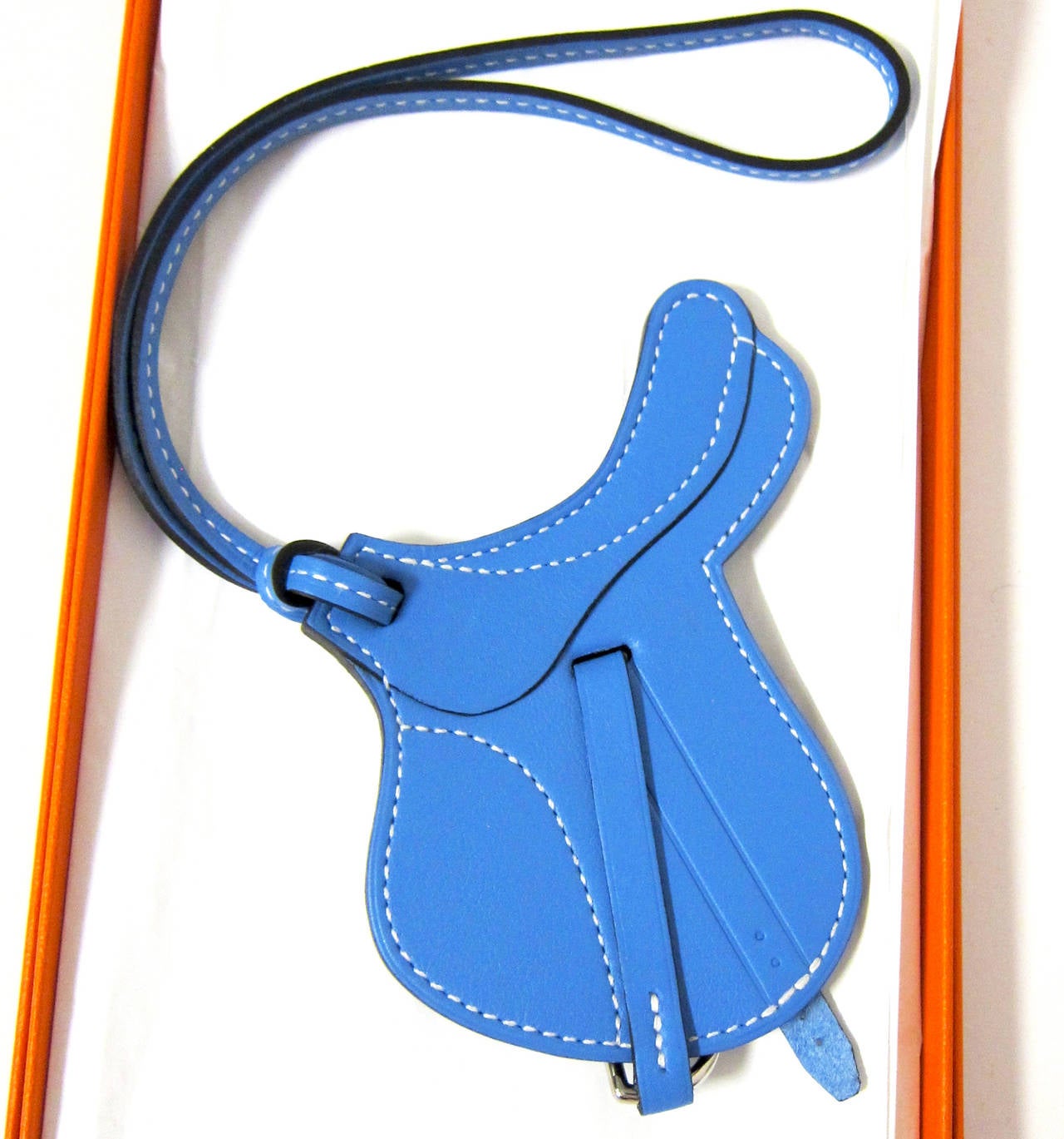 Hermes Saddle Paddock Selle Blue Paradise Bag Charm at 1stDibs | hermes  saddle cover, hermes saddle charm, paddock paradis