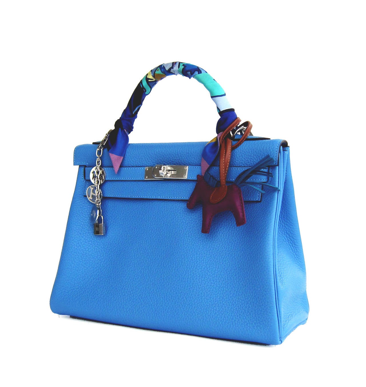 Hermes Blue Paradise 32cm Kelly Palladium Hardware Chic

Perfect Gift!  Brand New in Box- Store Fresh
Comes full set with keys, lock, clochette, shoulder strap, a sleeper for the bag, rain protector, Hermes ribbon, and original box. 
Blue