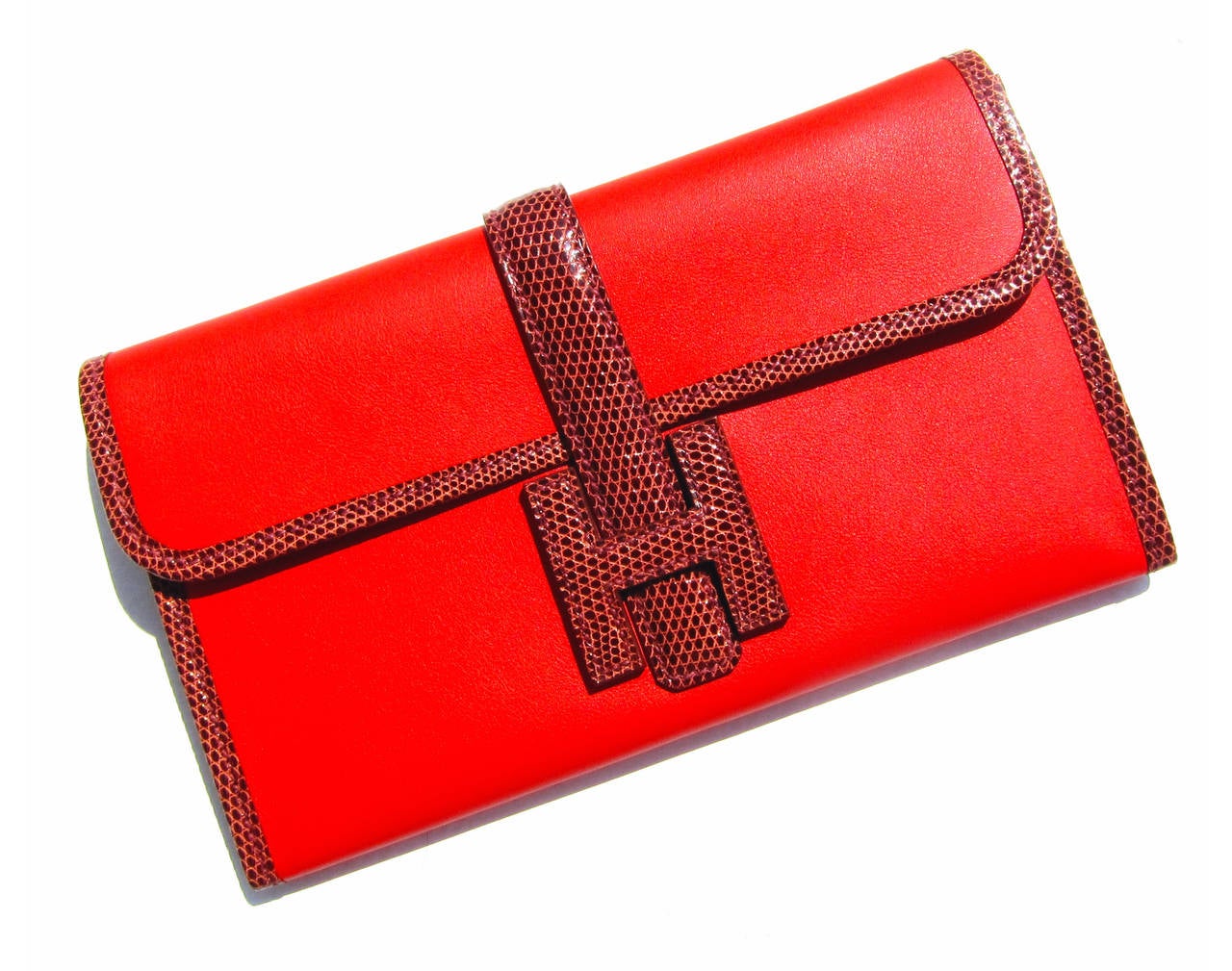 Hermes Capucine Etrusque Swift Lizard Niloticus Jige Duo Mini Clutch

Brand New in Box 
Store fresh coming with sleeper, Hermes box and ribbon
Absolutely stunning and rare
Capucine is a vibrant orange with red tone
In Swift trimmed with