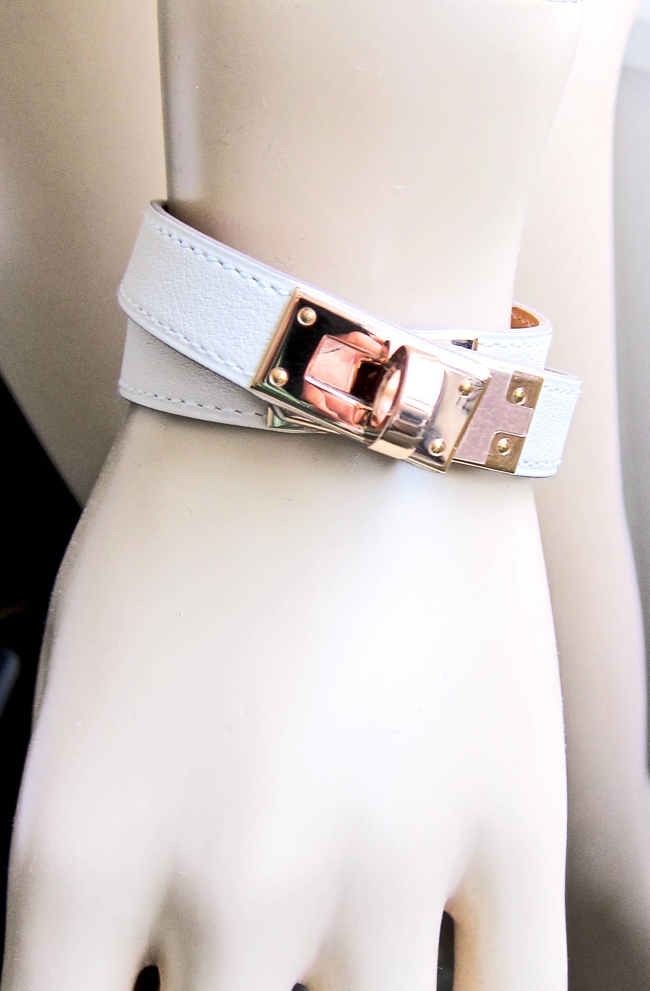 Hermes Craie Swift Rose Gold Kelly Double Tour Leather Bracelet Small 

Brand New in Box Coming with Hermes velvet pouch, box and ribbon 
Latest hottest *ROSE Gold* series release from Hermes for Spring 2015 
Craie (chalk) with Rose Gold is a