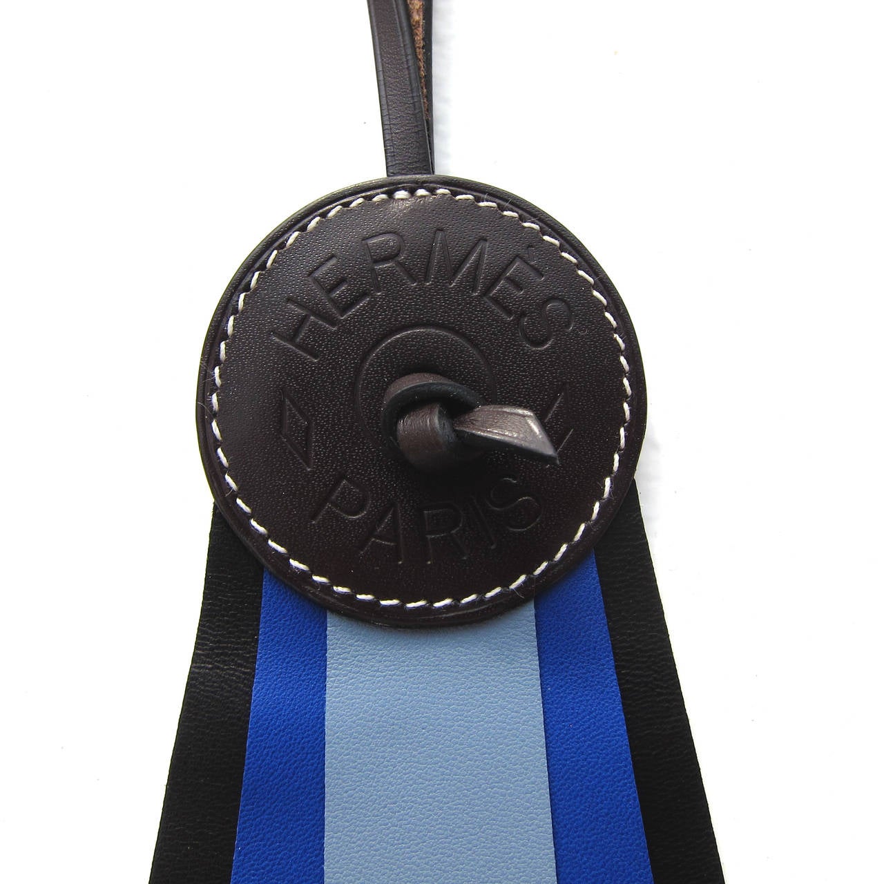 Hermes Paddock Flot Horse Ribbon Charm Equestrian Love

Limited edition collector's item
Black/ Blue Electric / Blue Lin Paddock Flot Leather Charm
Brand new in box coming with Hermes presentation gift box and ribbon
Store fresh, never