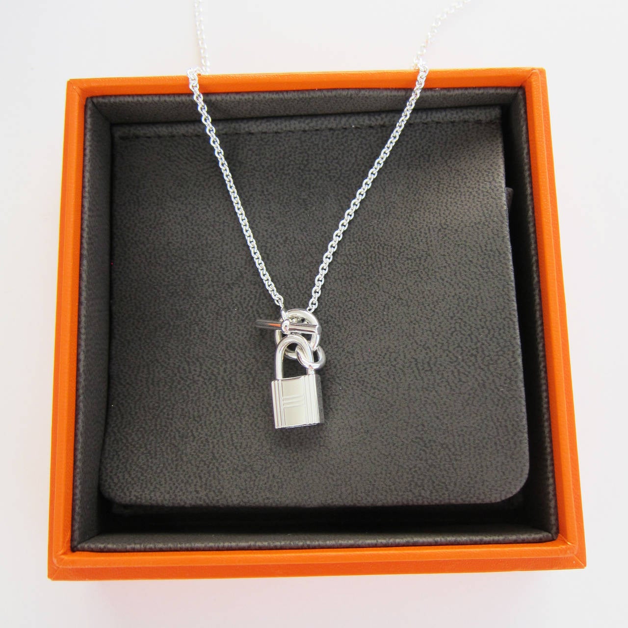 Hermes Cadenas Kelly Lock Silver Pendant Necklace Below Retail In New Condition In New York, NY