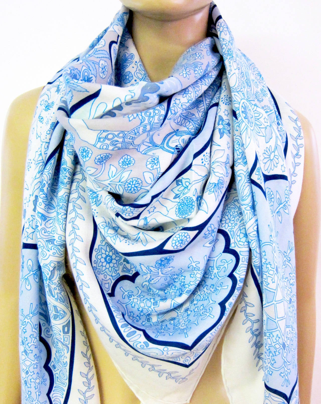 HERMES Aux Portes du Palais Cashmere Silk GM Shawl Scarf

Colors: White, Light Grey, Light Blue, Dark Blue 
Brand new in box. Absolutely store fresh coming with Hermes box and ribbon.
Sold out!  
Gorgeous details
Very versatile colorway with