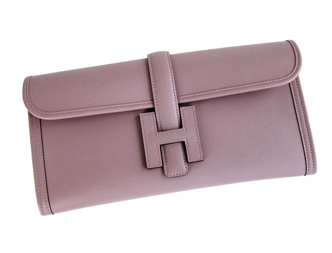 HERMES Glycine Lilac Jige Elan Clutch 29cm Chic

Perfect Gift! Brand New in Box
Never Carried. Store Fresh- T stamp! 
Comes in full set with Hermes dust bag, Hermes ribbon, and original Hermes box.
Fabulous new color Glycine (