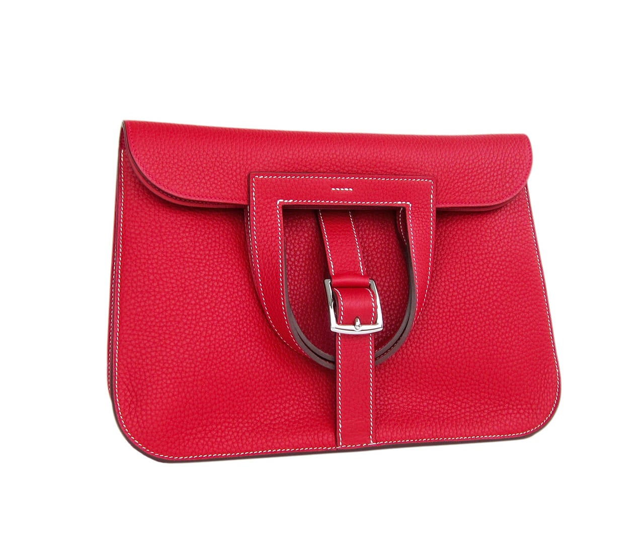 Hermes Rouge Casaque Red Halzan 4-way Clemence Crossbody Bag

Brand New in Box 
Store fresh T stamp
Comes in full set with box, ribbon, dustbags, shoulder strap
Stunning color way of the wildly successful new Halzan bag
Rouge Casaque is the