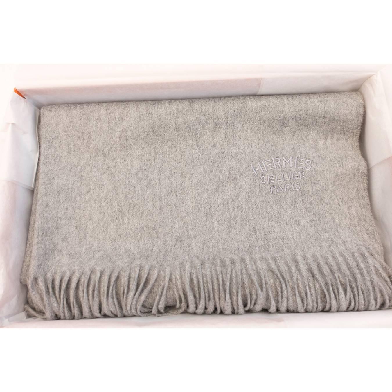 Store fresh. Pristine condition. 
Perfect gift! Comes full set with Hermes box and ribbon. 
Below retail of $1171 including tax where we are. 
Luxuriously soft 100% cashmere scarf / stole is brand new for fall winter 2015 Double faced cashmere