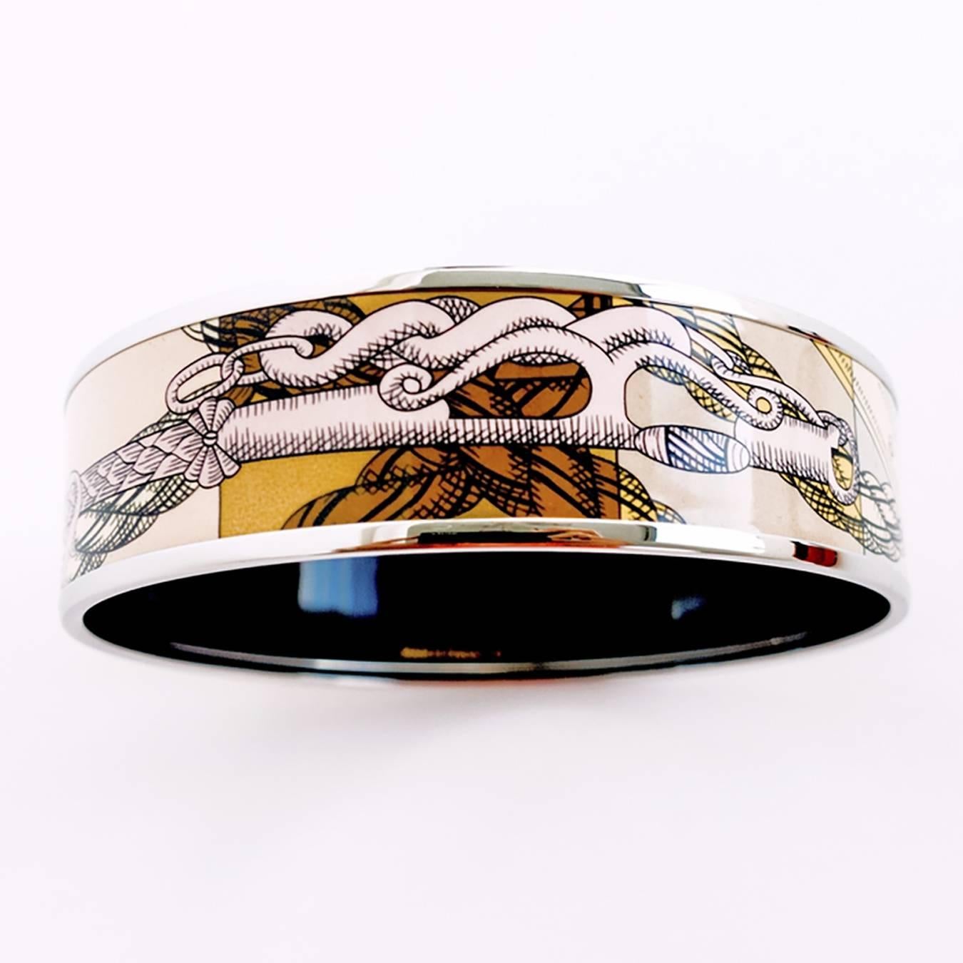 Store fresh.  Pristine condition.
Perfect gift! Comes full set with Hermes velvet sleeper, box, and ribbon.
Fabulous Della Cavalleria printed enamel bracelet.
Gorgeous details designed by Virginie Jamin. 
Trimmed with fresh palladium